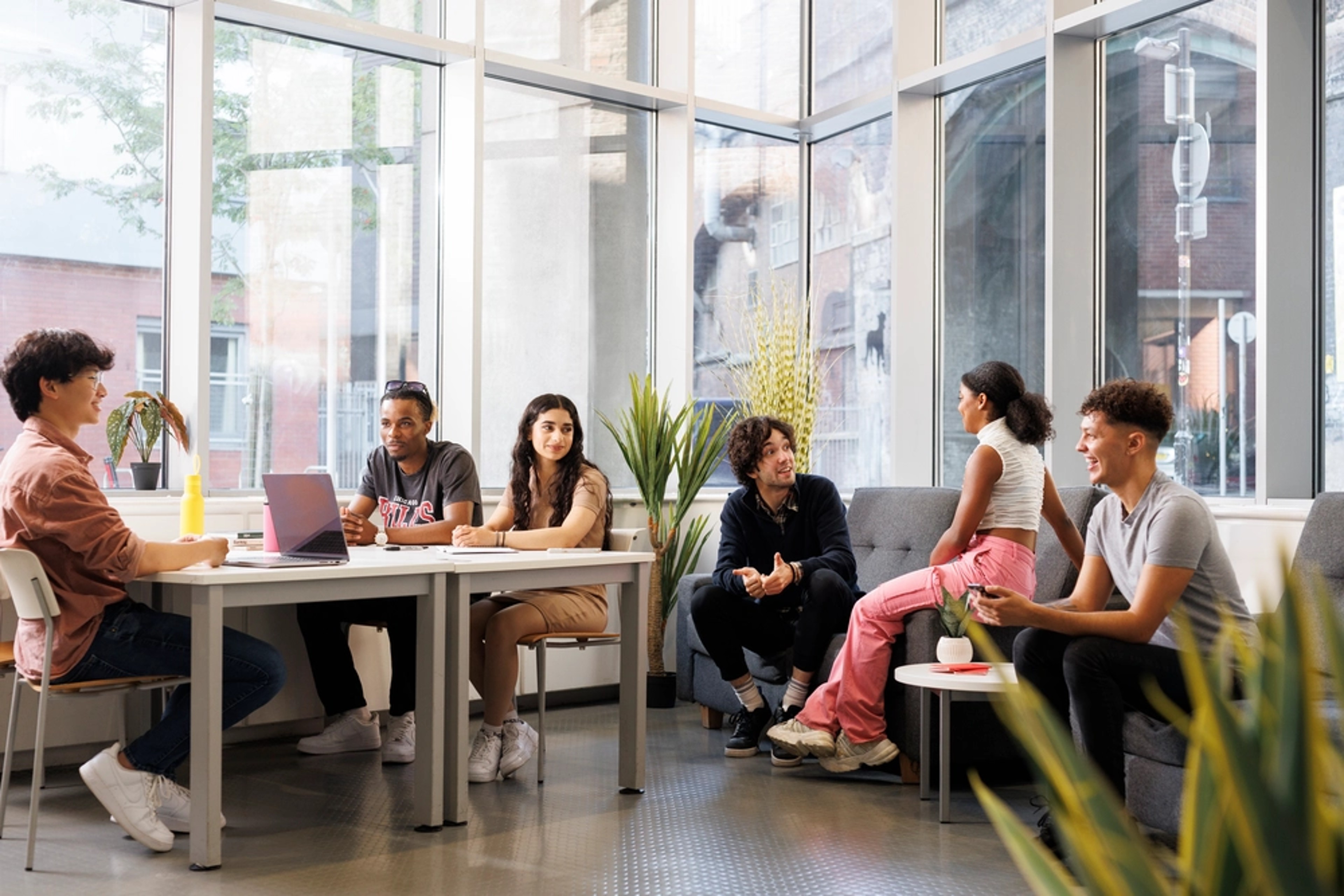 Students in the reception seating area