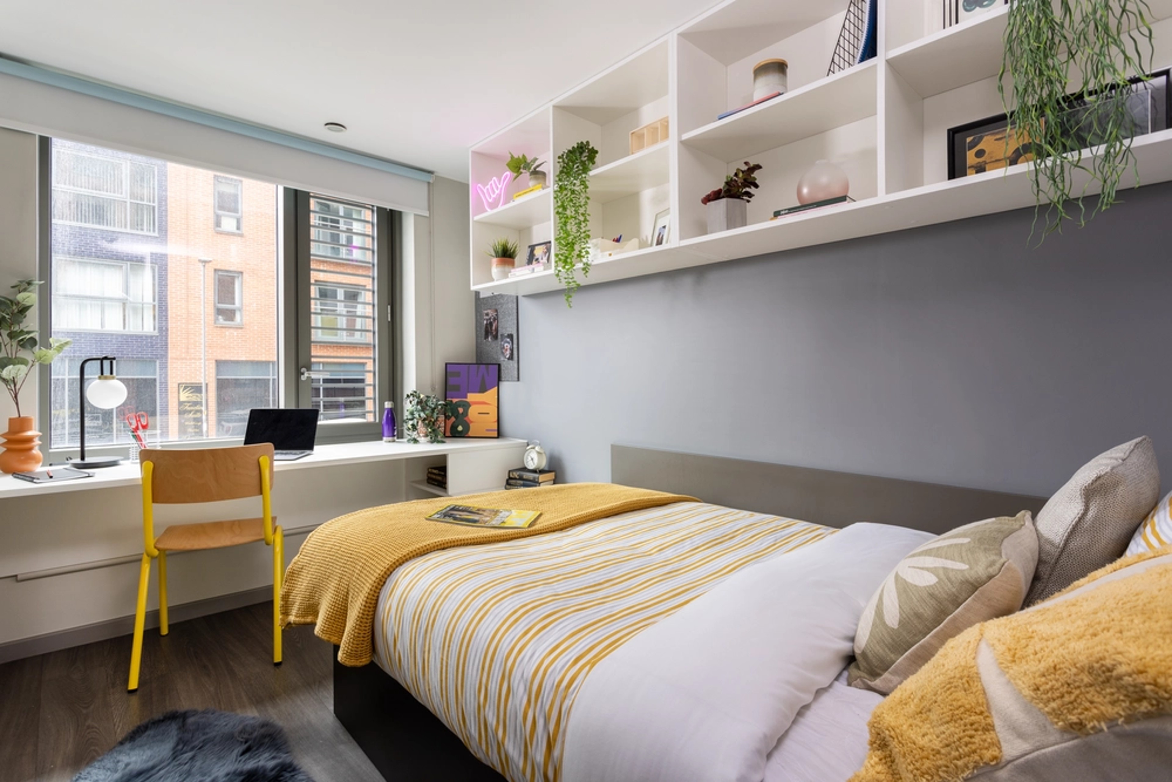 Bed and study space in an En-suite room