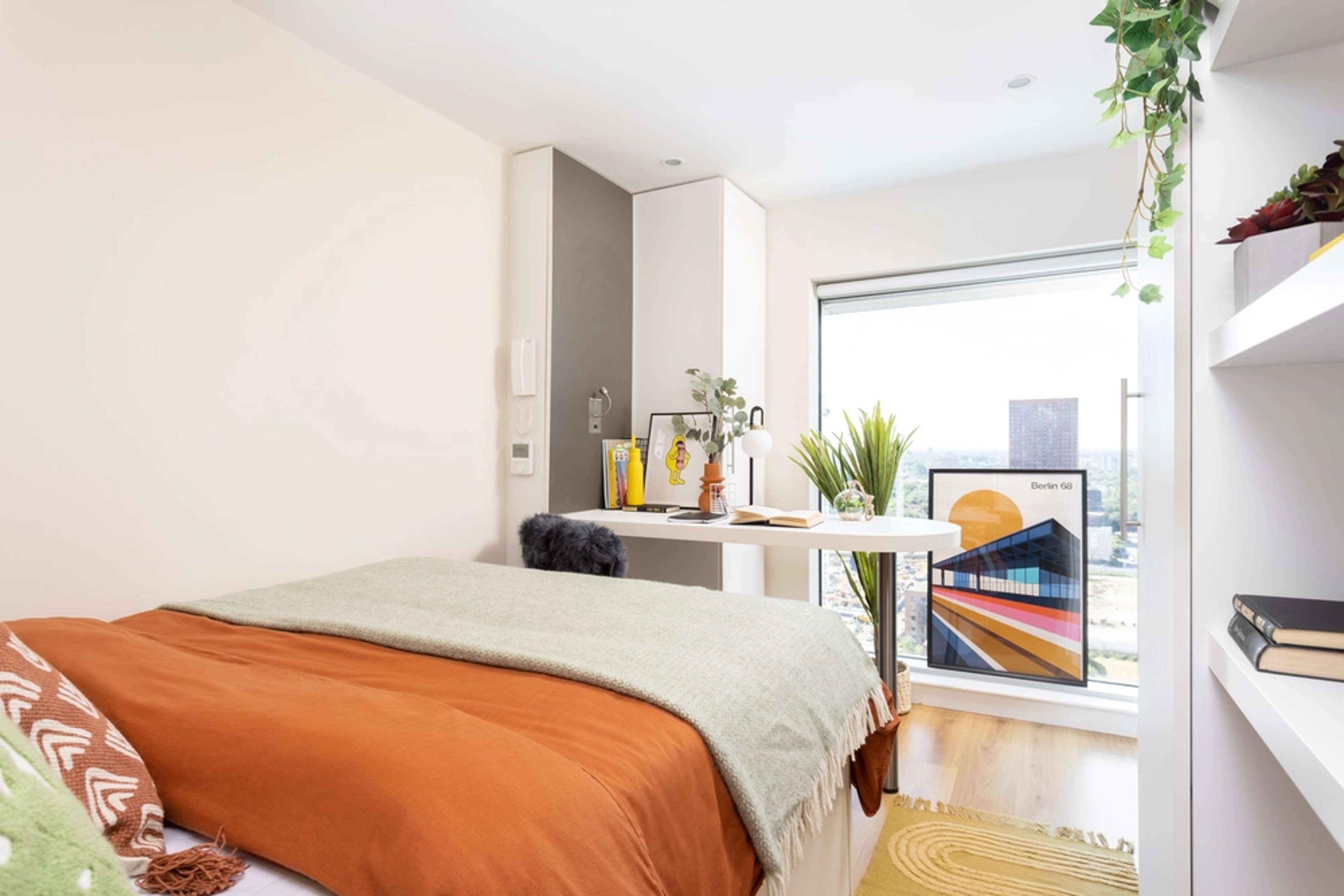 Bed and study space in an En-suite room