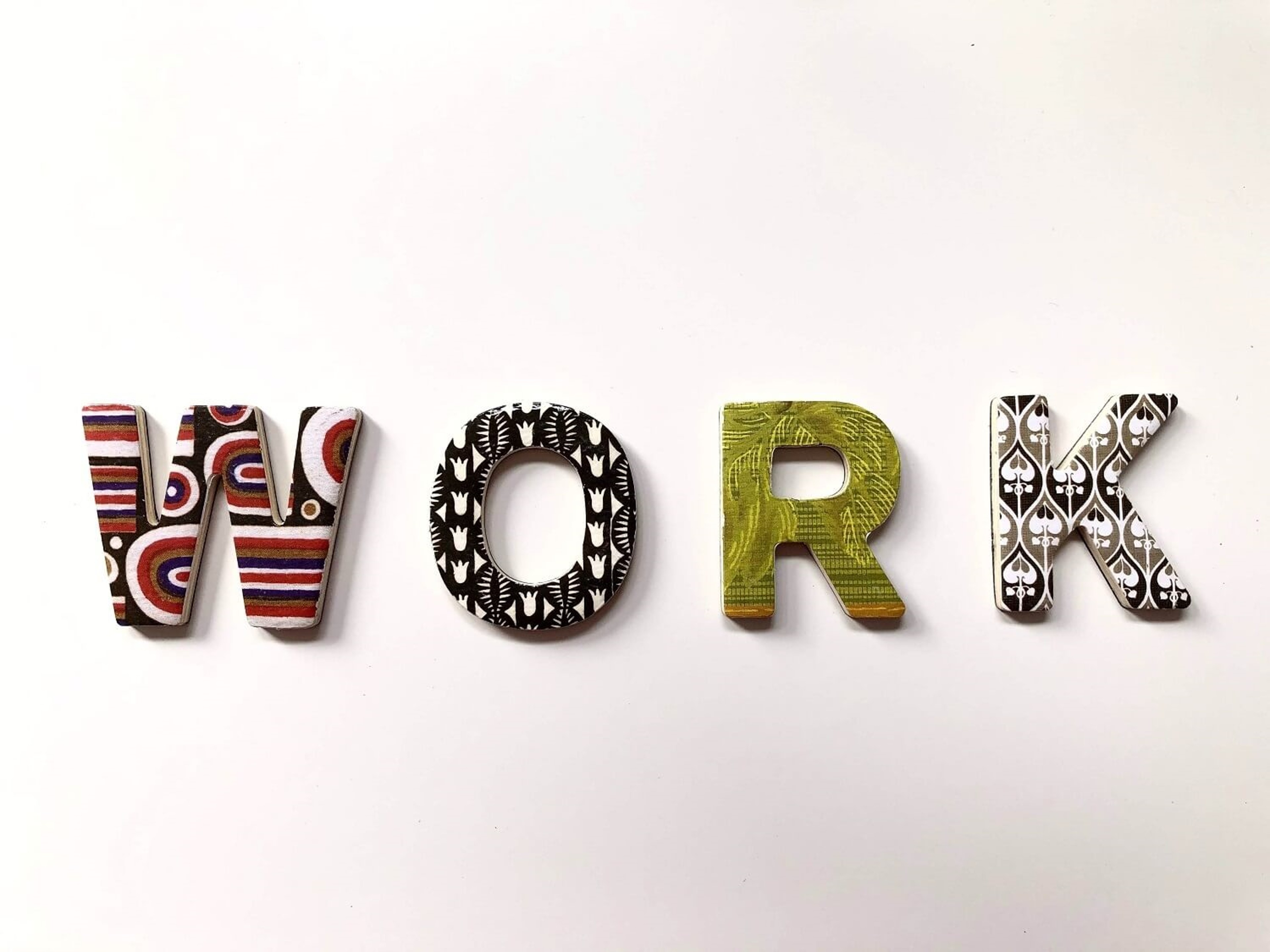 The word 'Work' in fabric letters