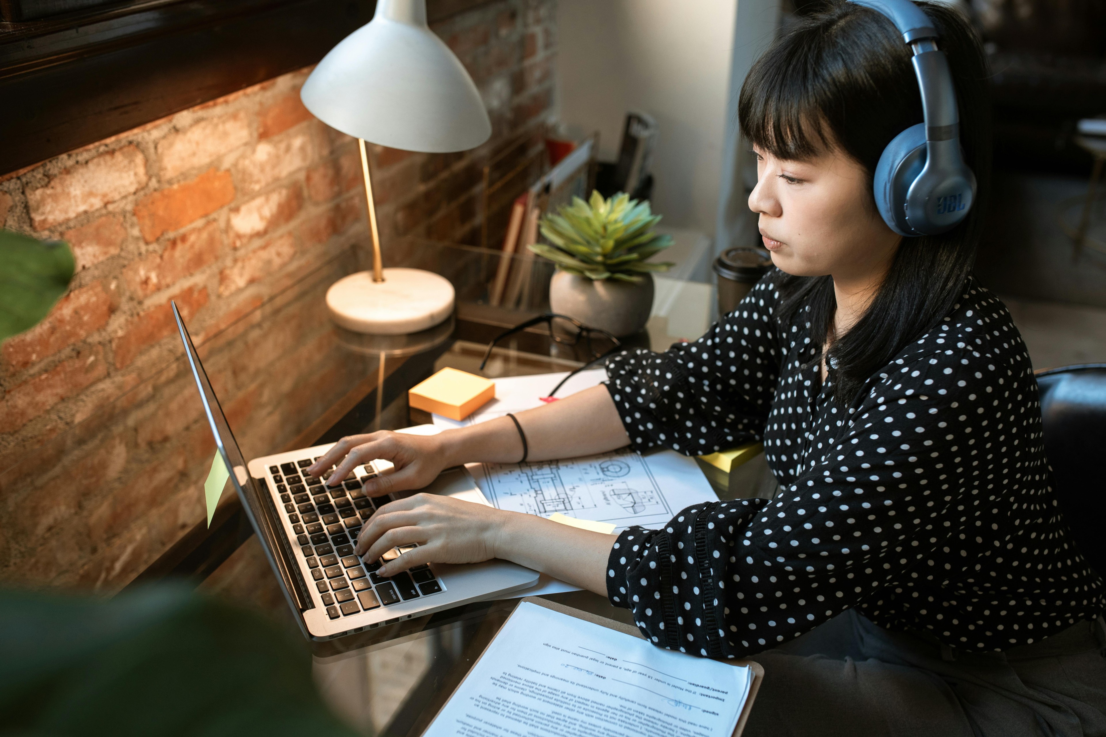 Girl typing on laptop