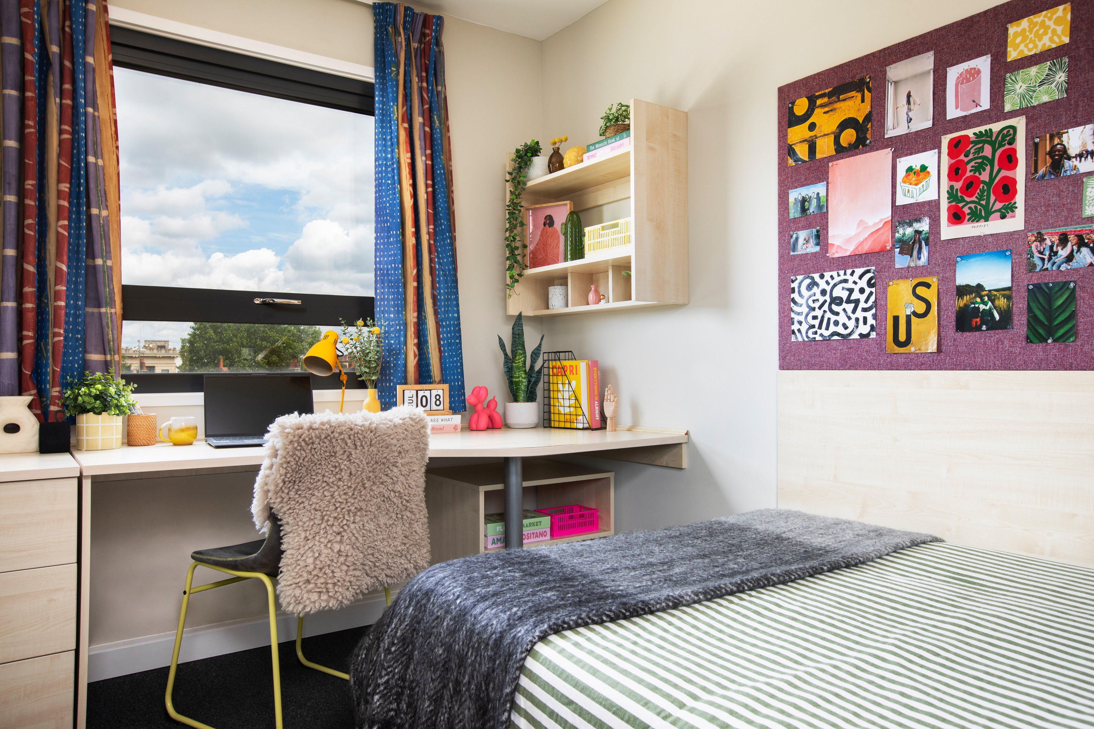 Bed and study space in an En-suite room