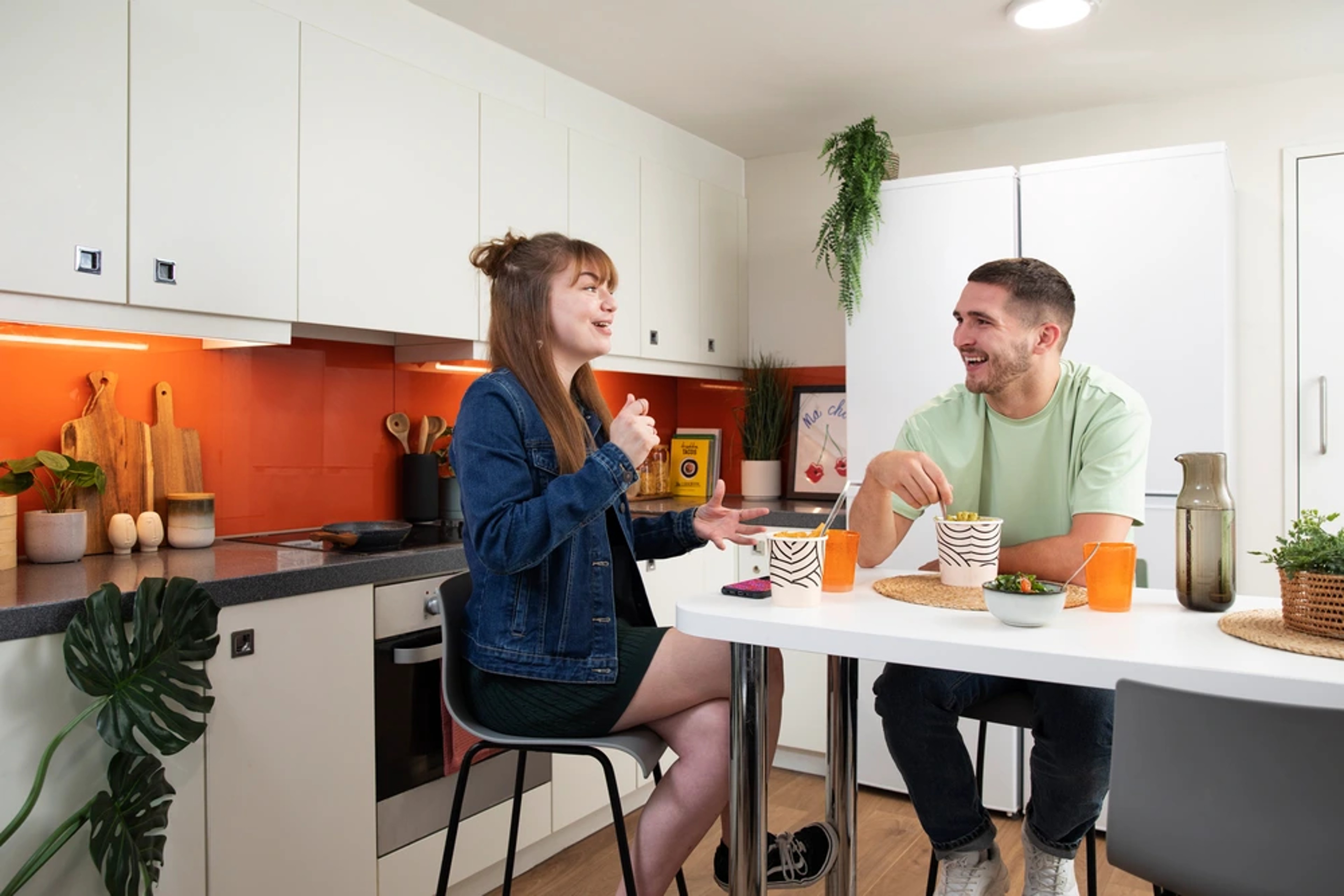 Students in a shared kitchen