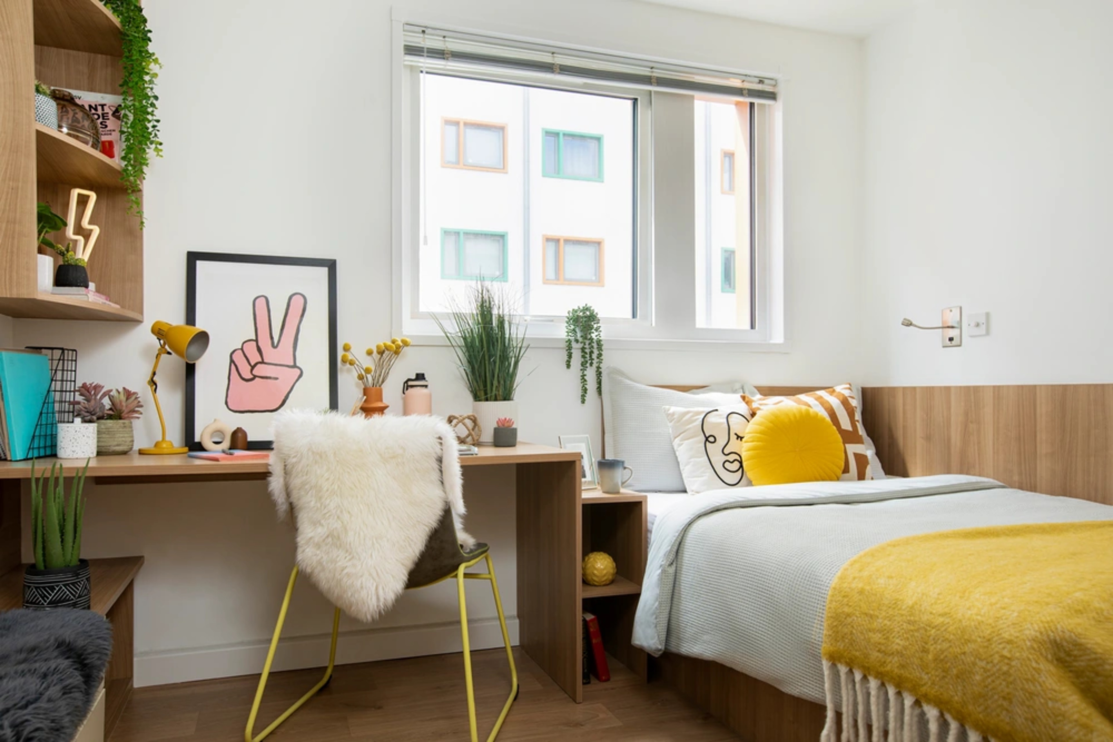 Bed and desk in an Accessible En-suite
