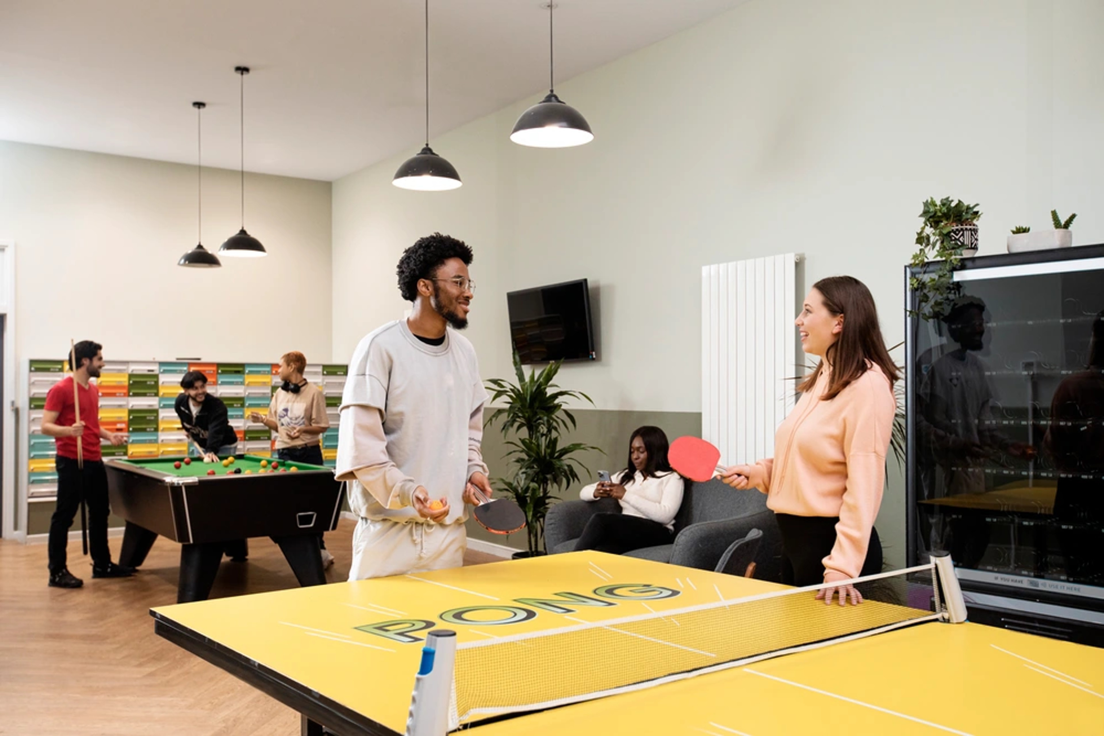 Students in the games area