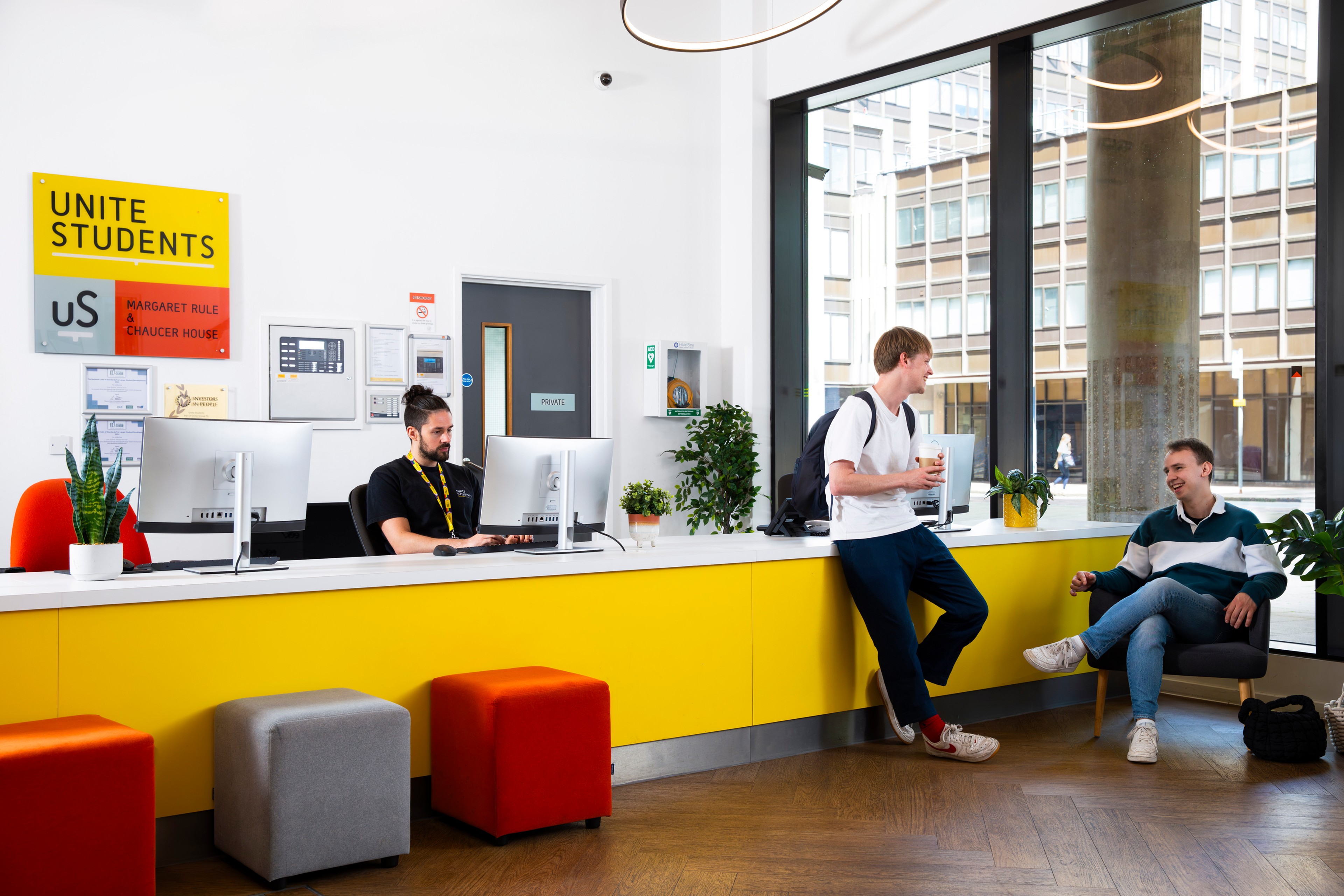 Students and staff in reception