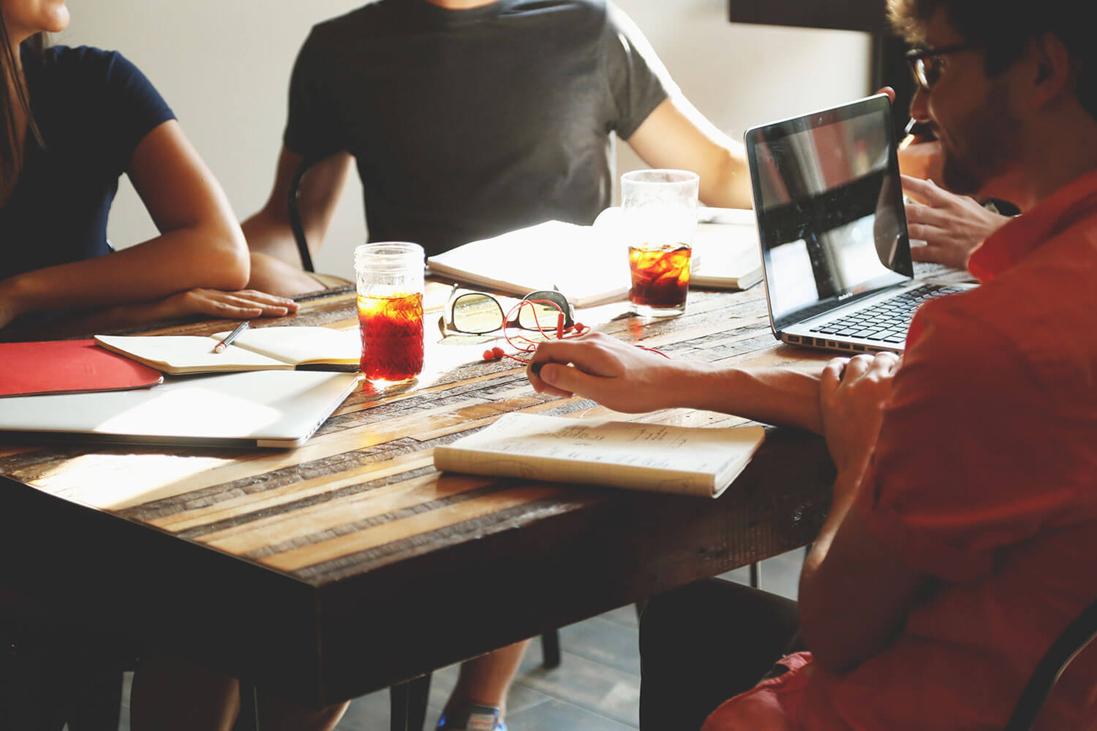 Group of people working at table
