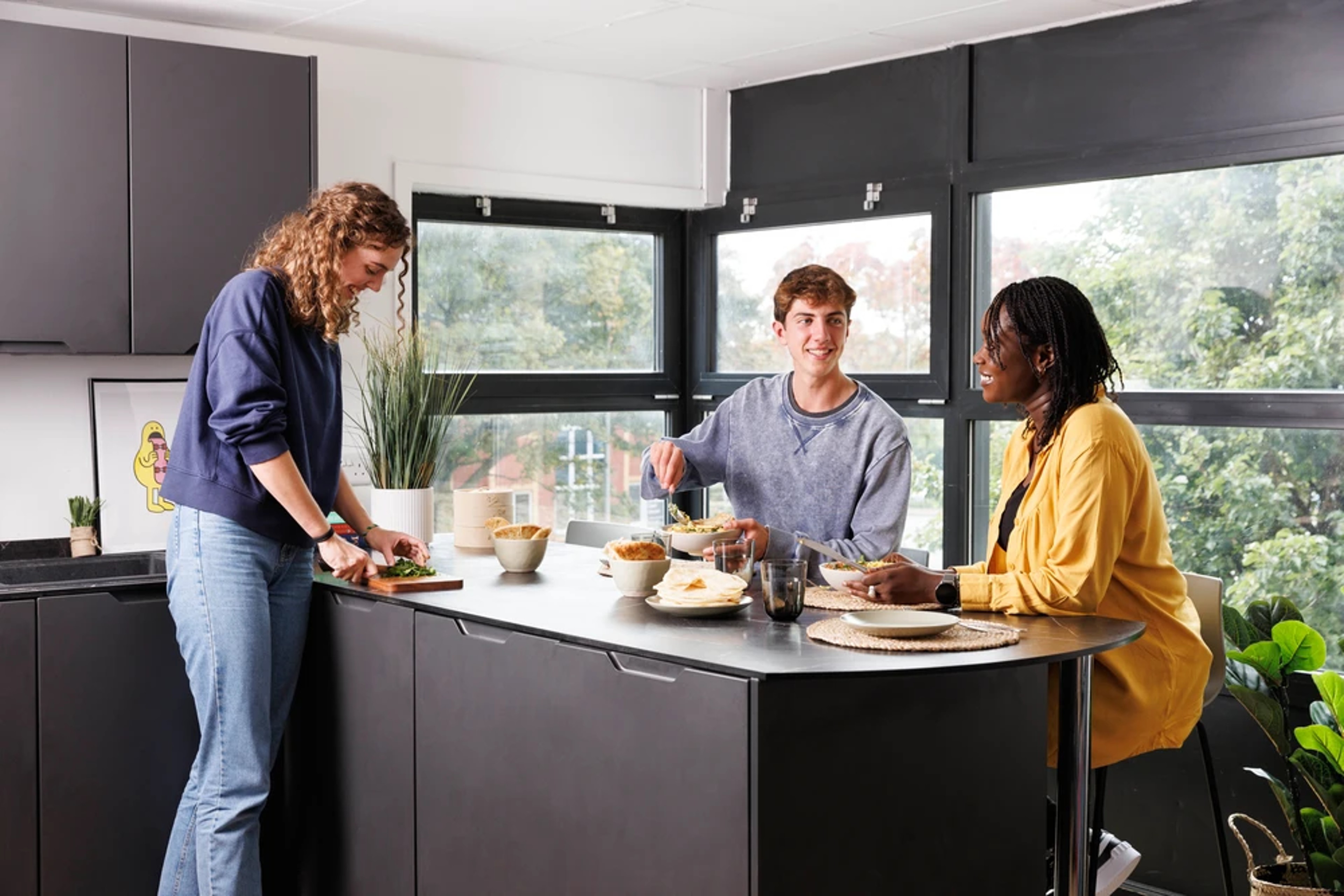 Students in a shared kitchen