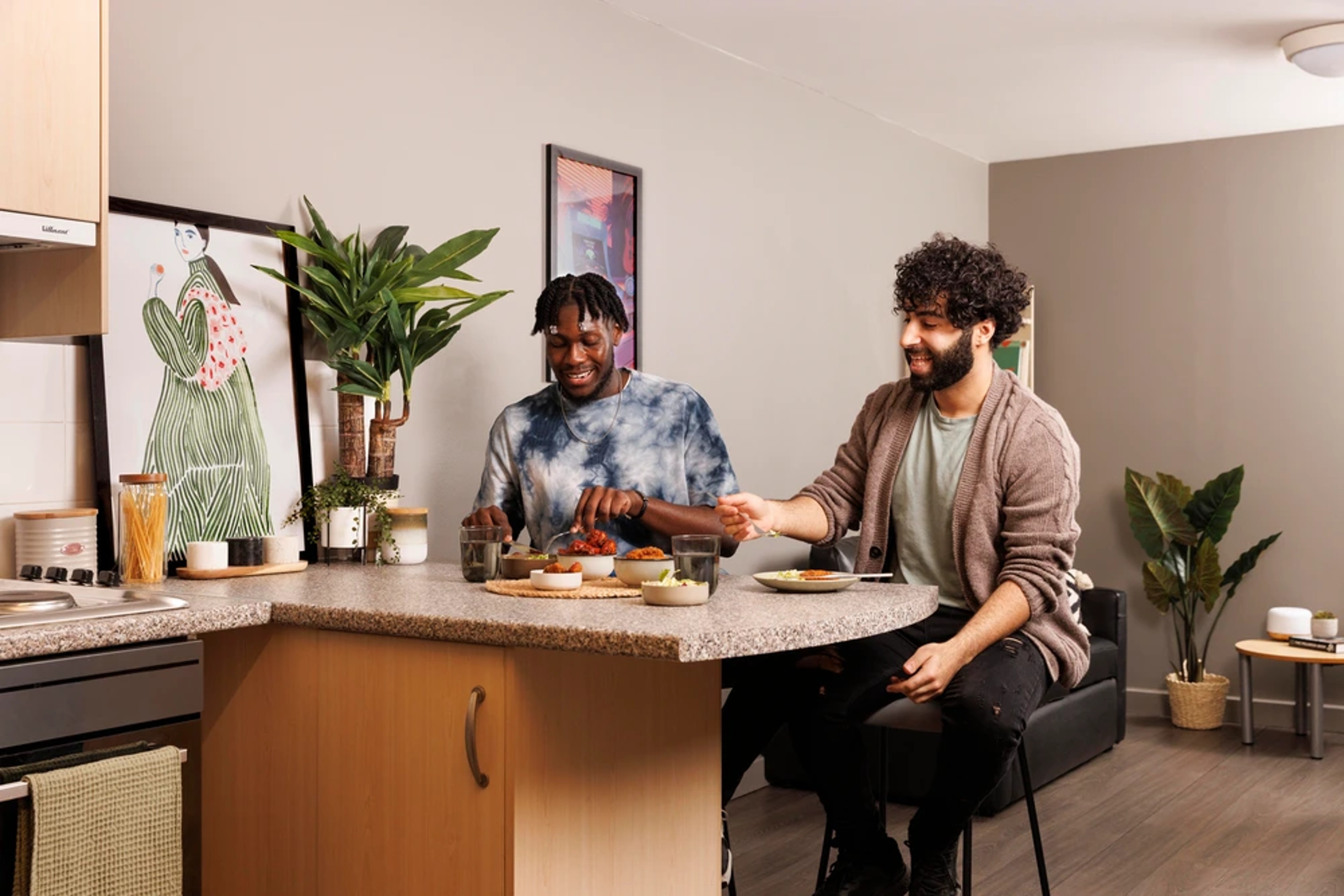 Students in a shared kitchen