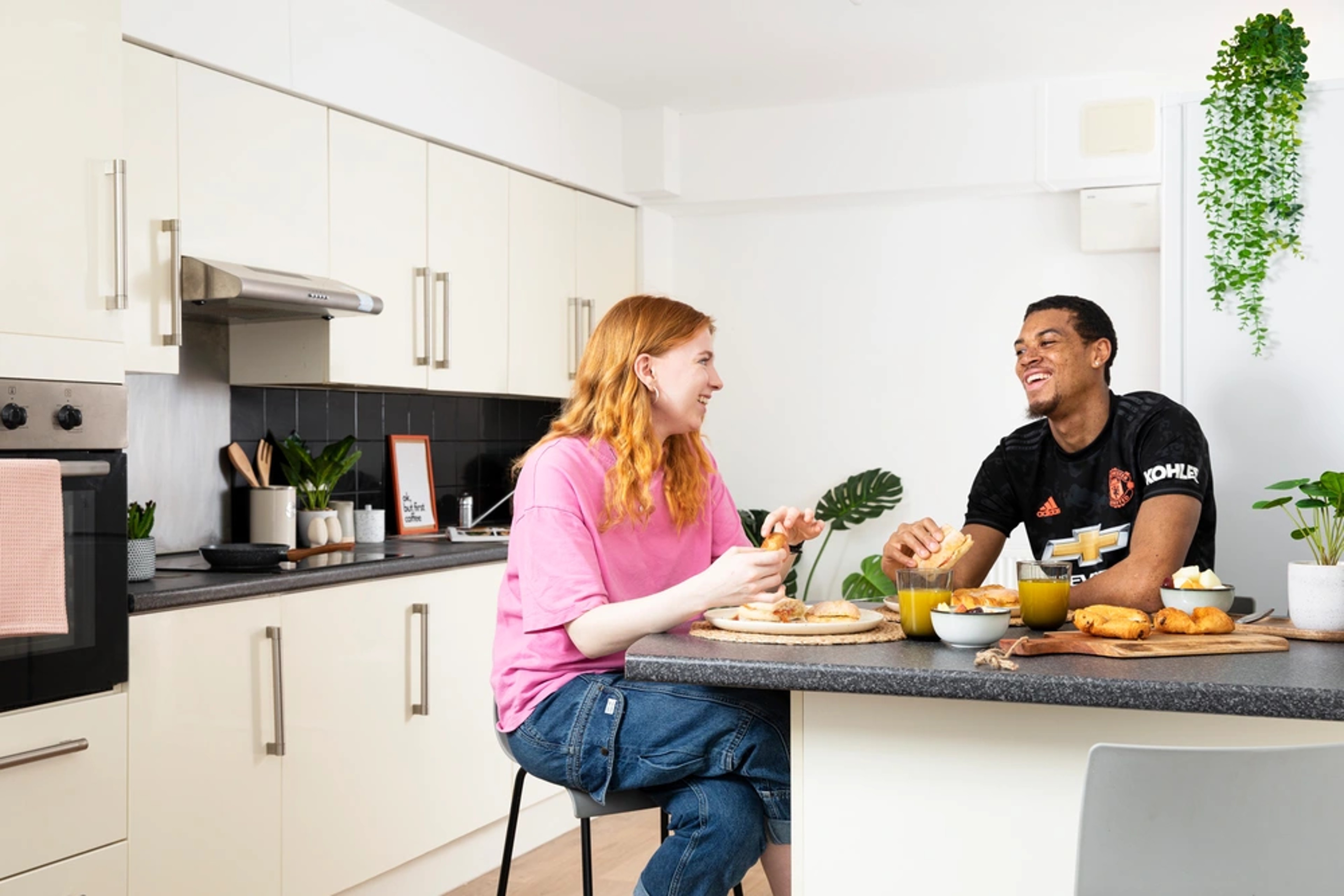 Students in a shared kitchen