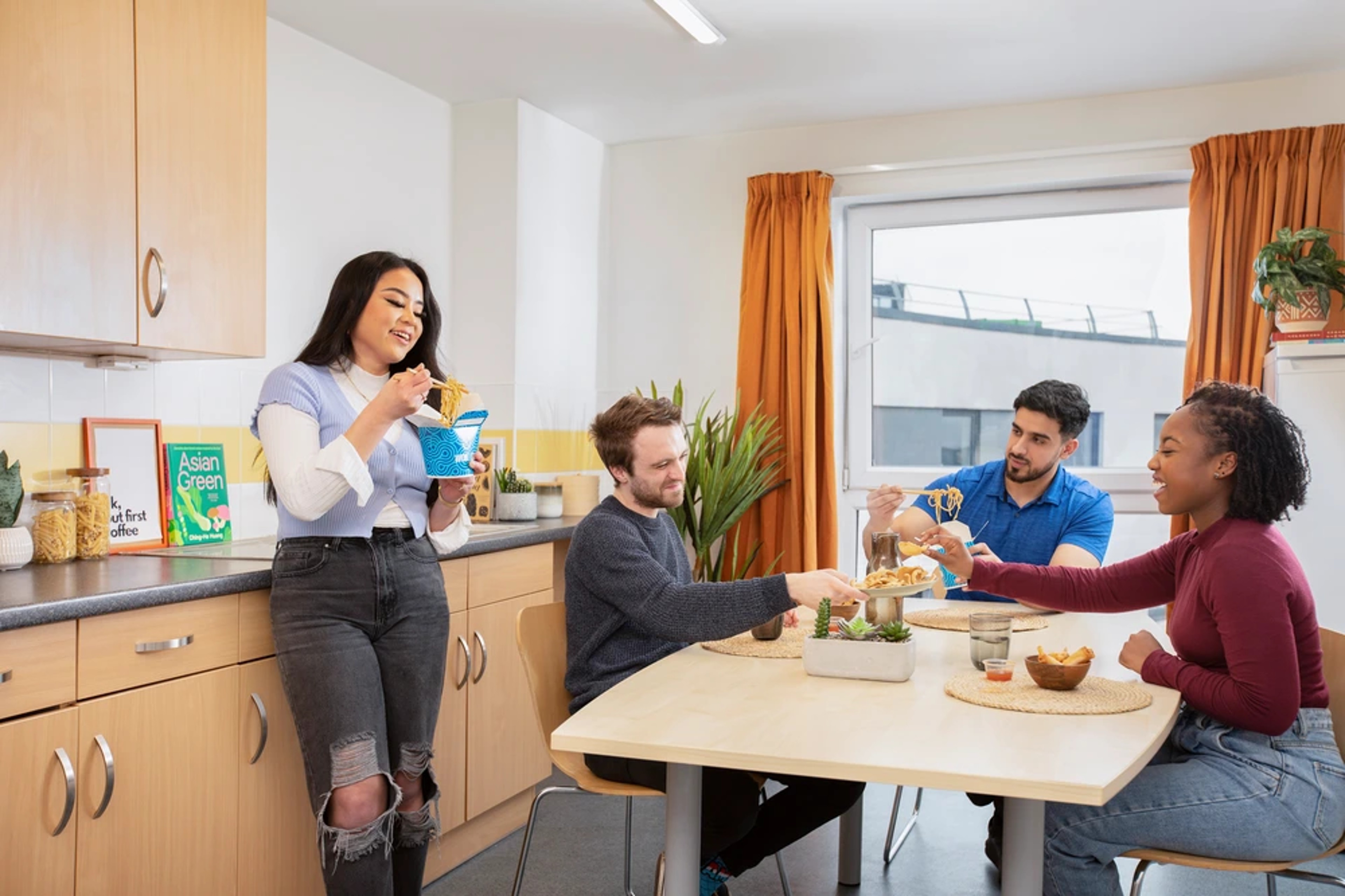 Students in a shared kitchen