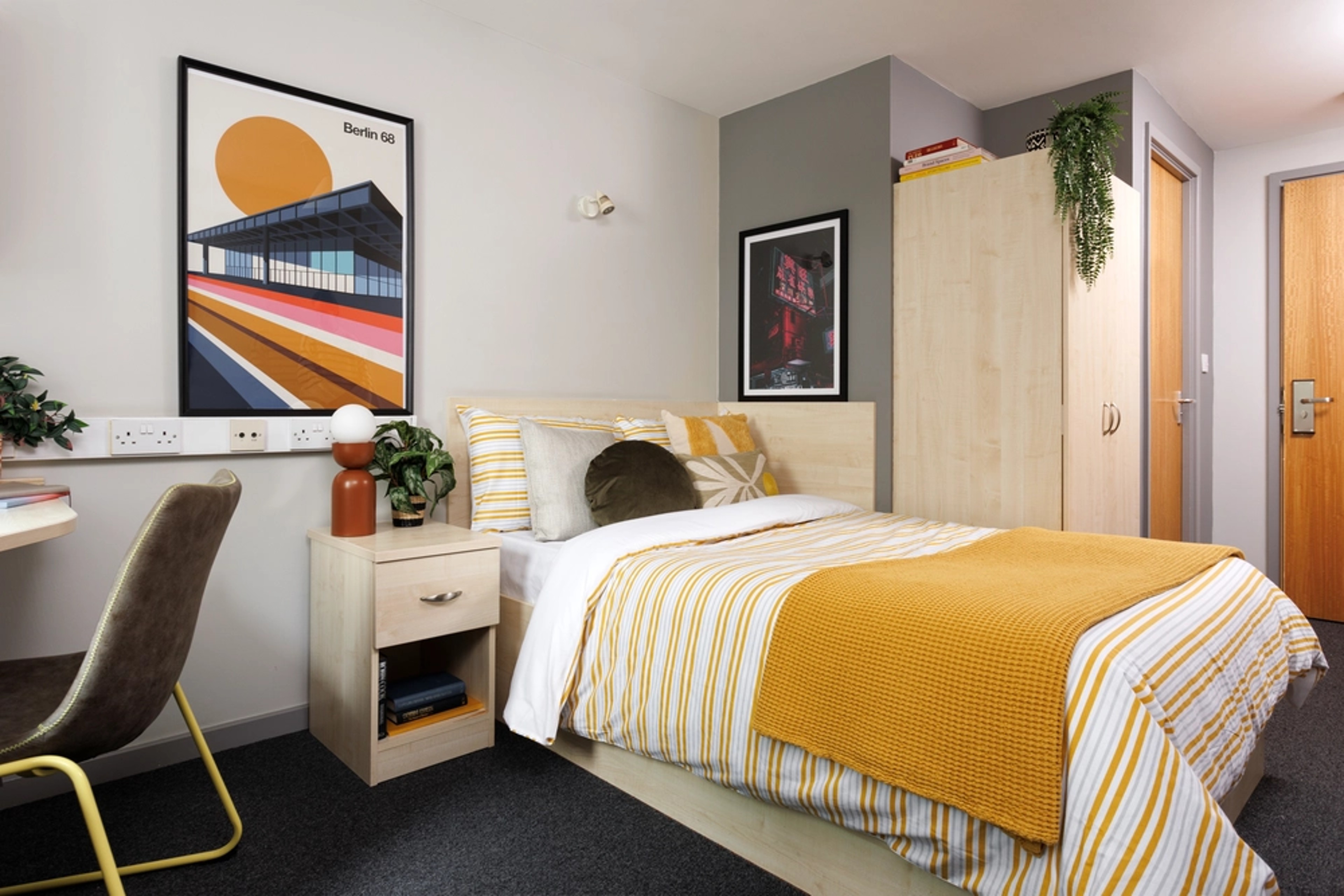 Bed and study space in an En-suite room