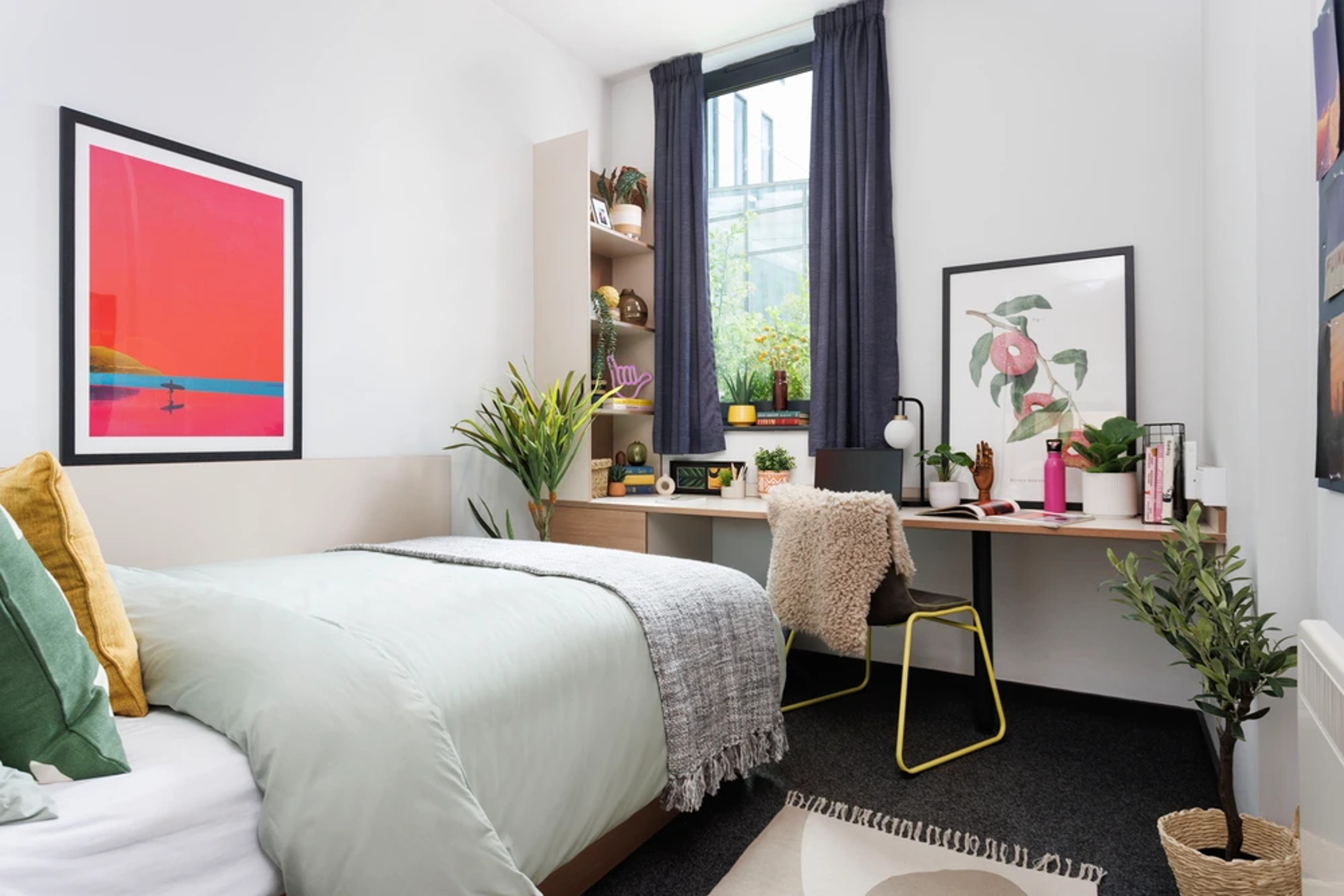 Bed and study space in an En-suite room