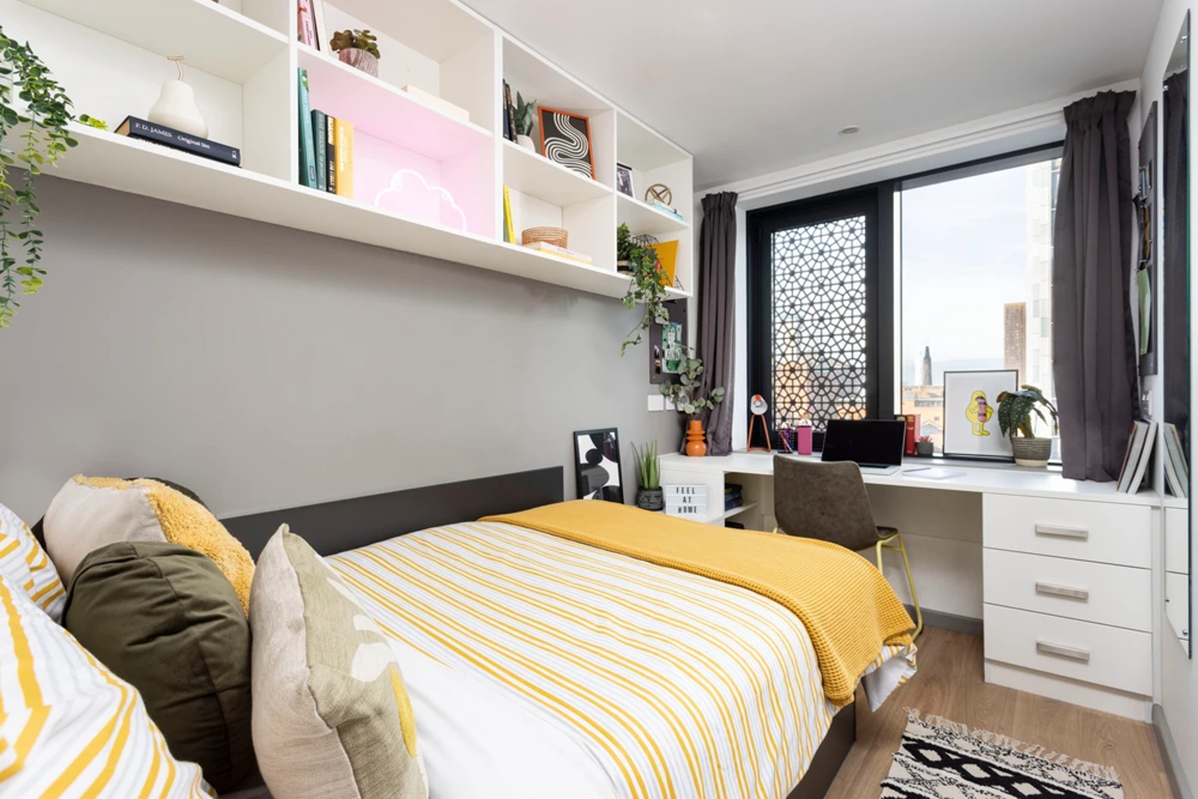 Bed and study space in an En-suite room