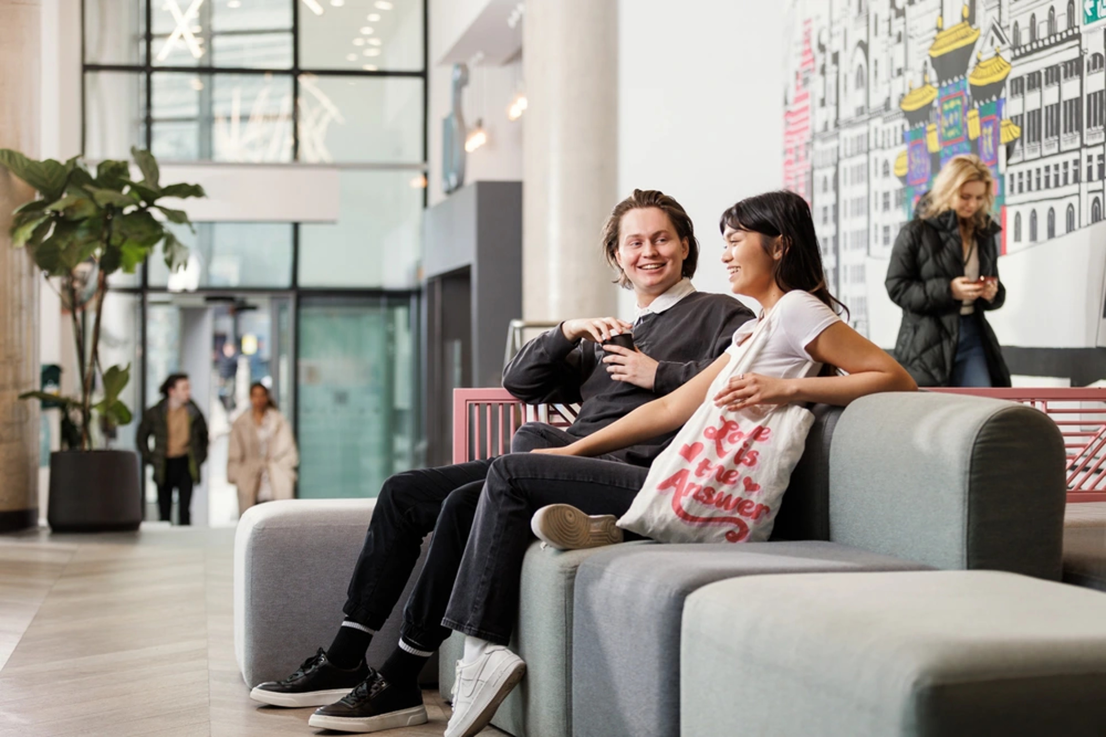 Students sitting on a sofa