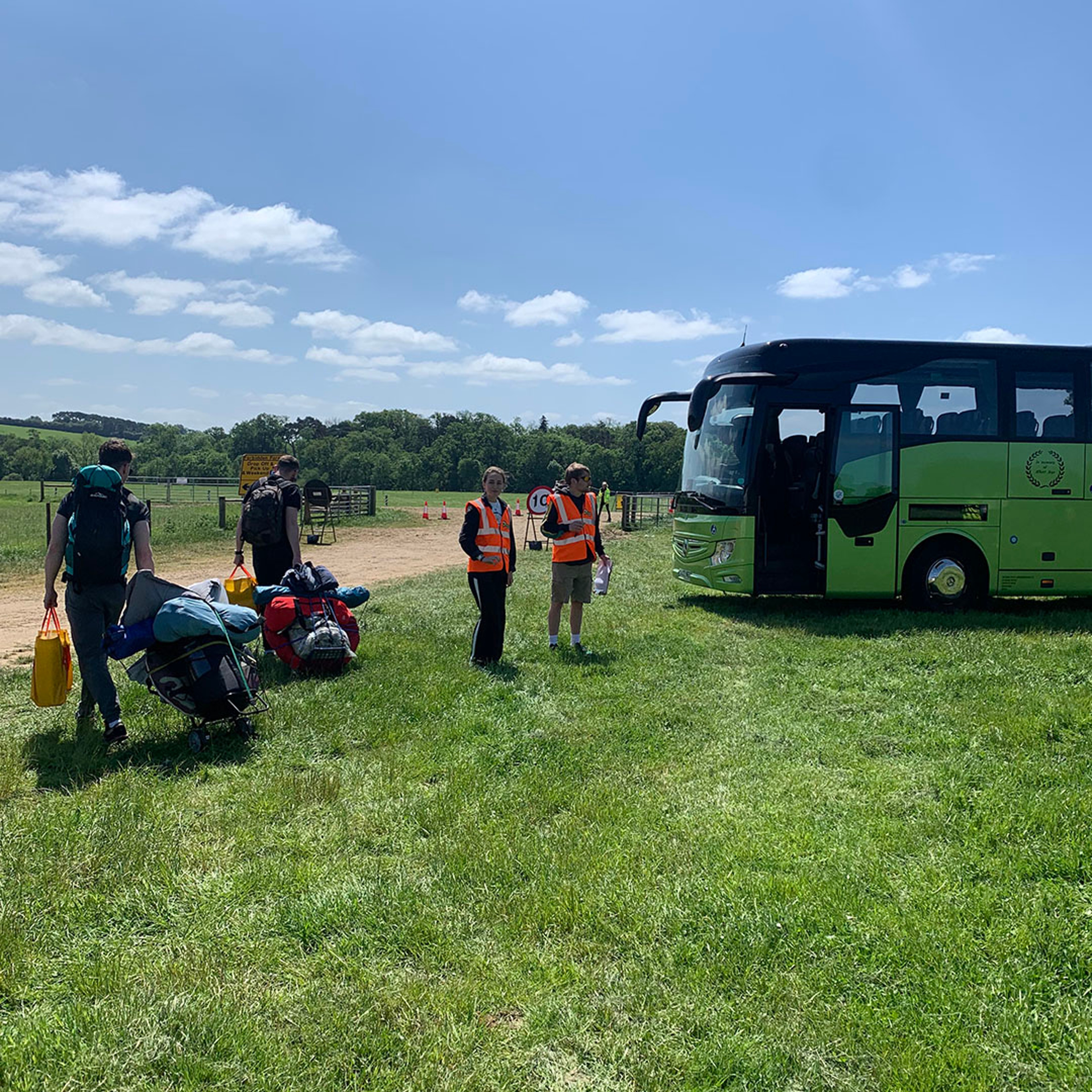Coach parked in field