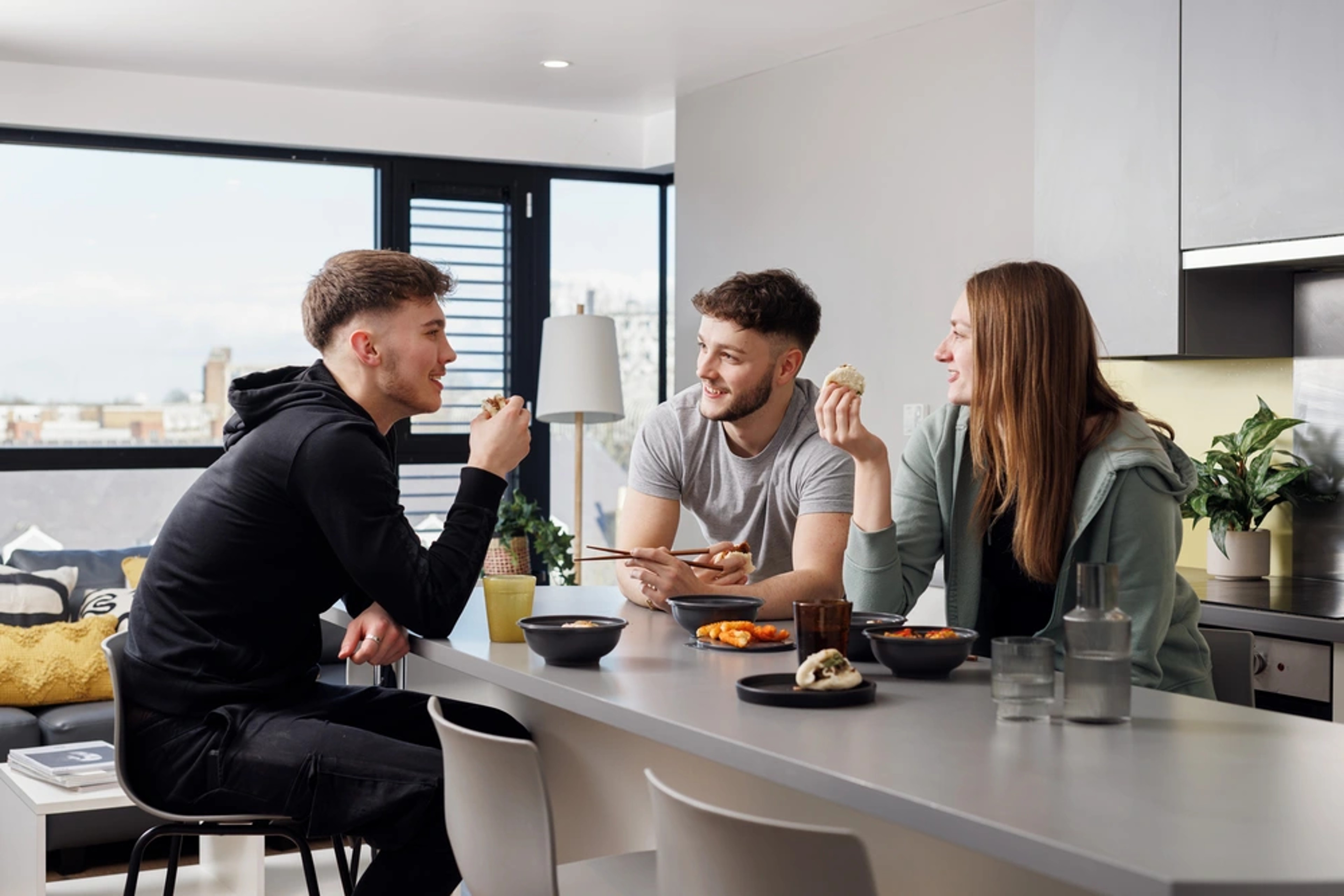 Students in a shared kitchen