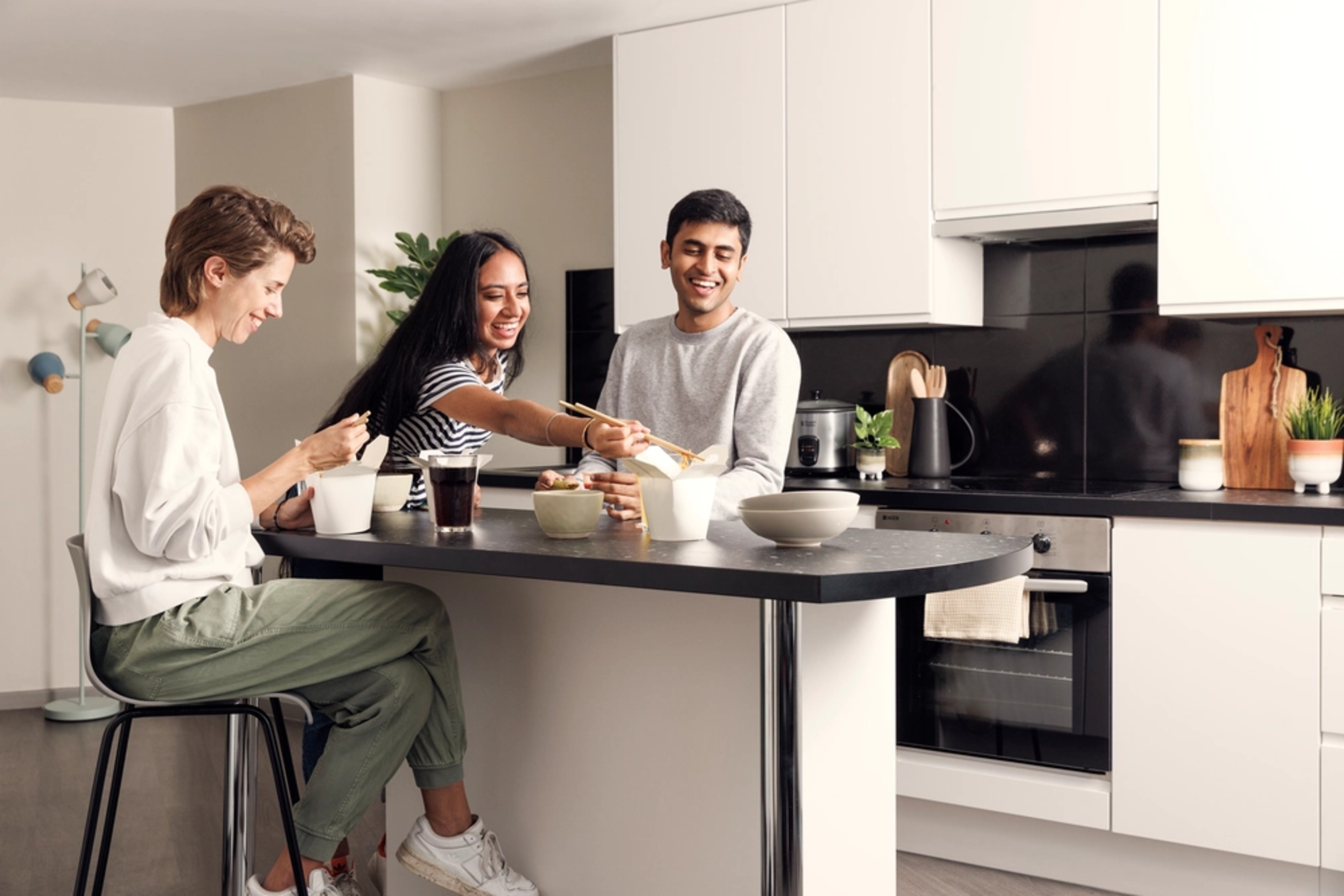 Students in a shared kitchen