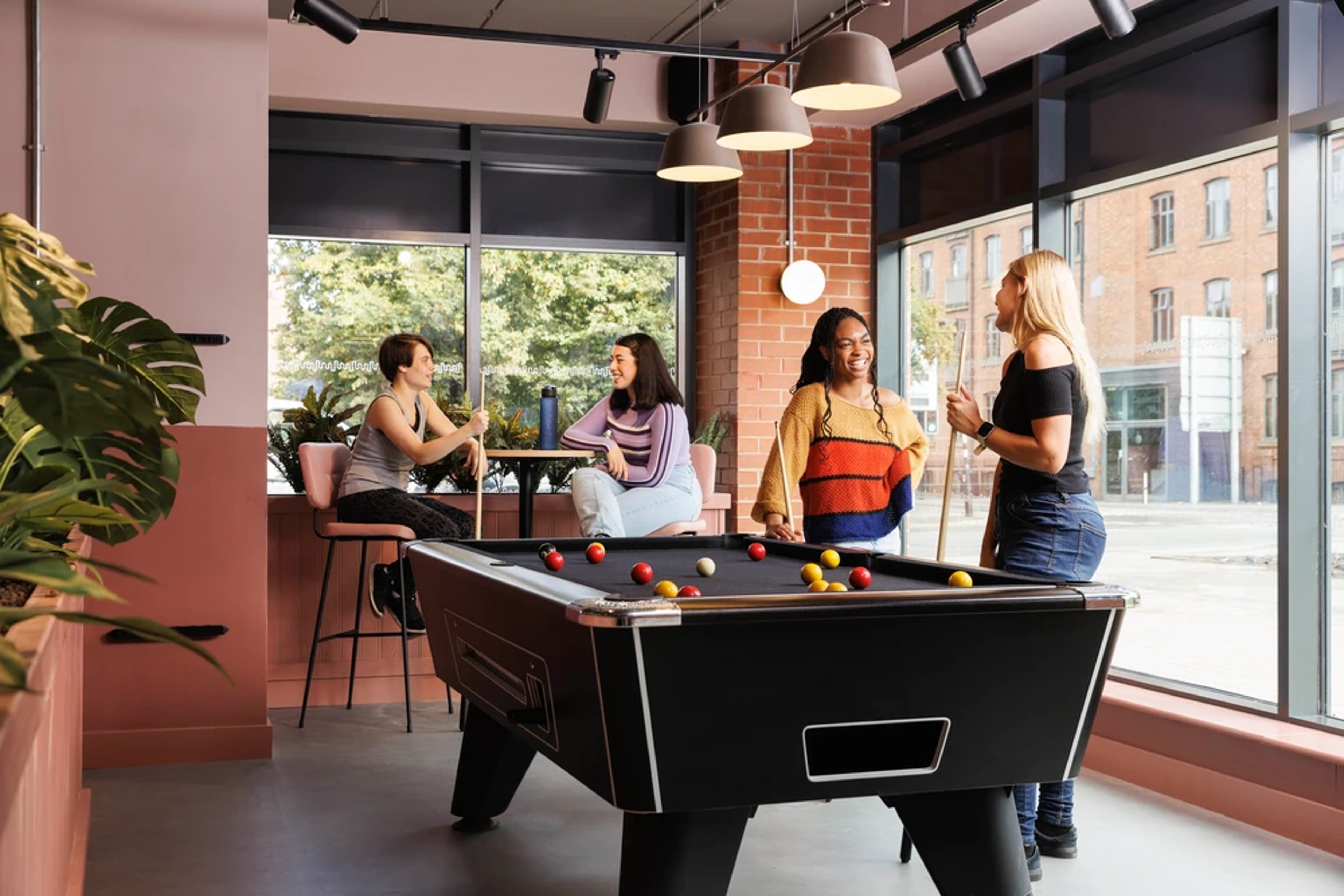 Students using the games area