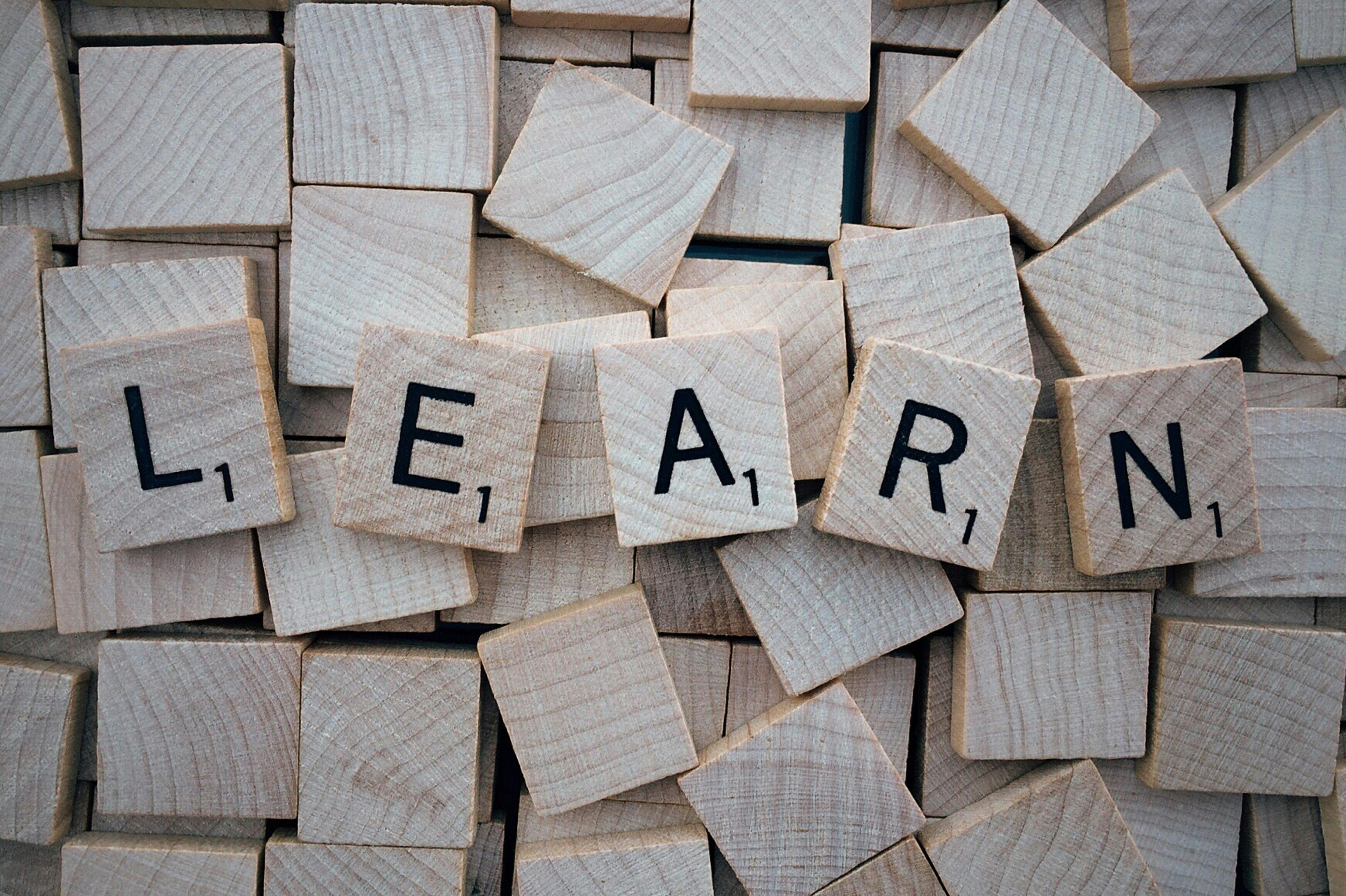 Words spelt out using scrabble letters