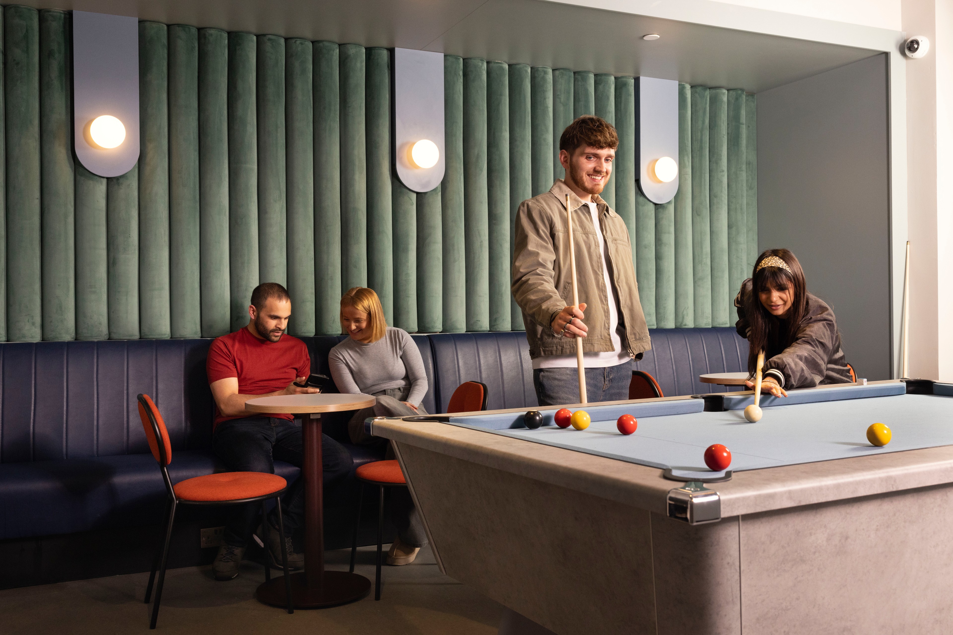 Students in pool lounge