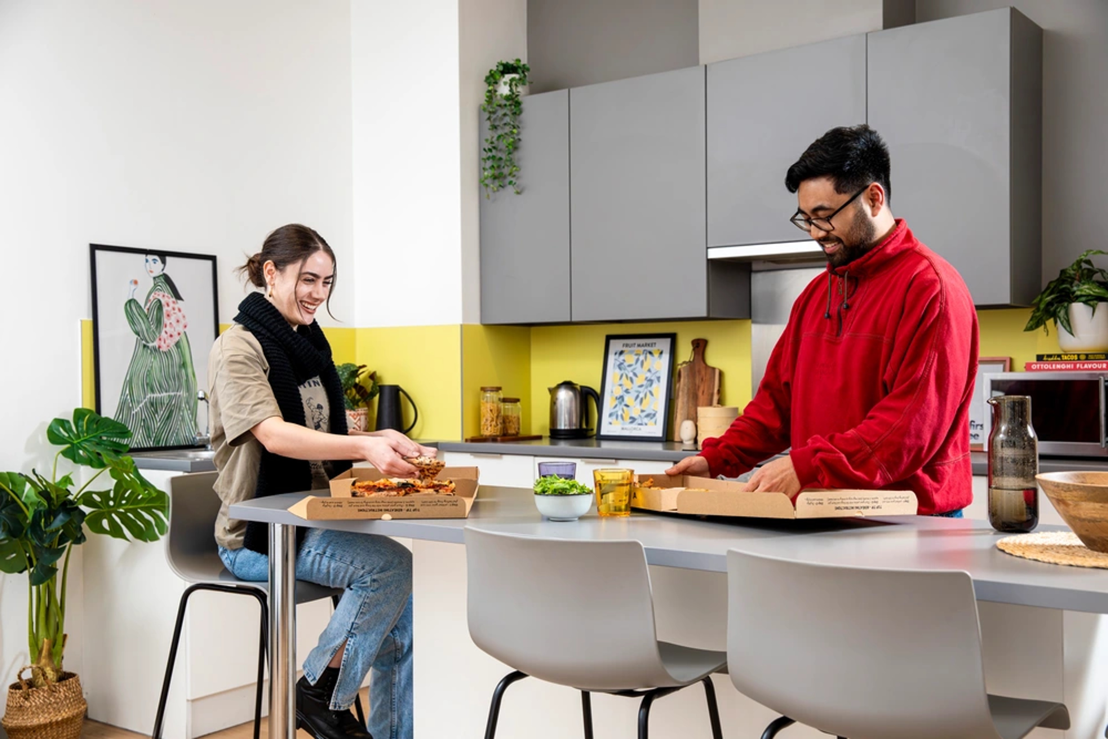 Students in a shared kitchen