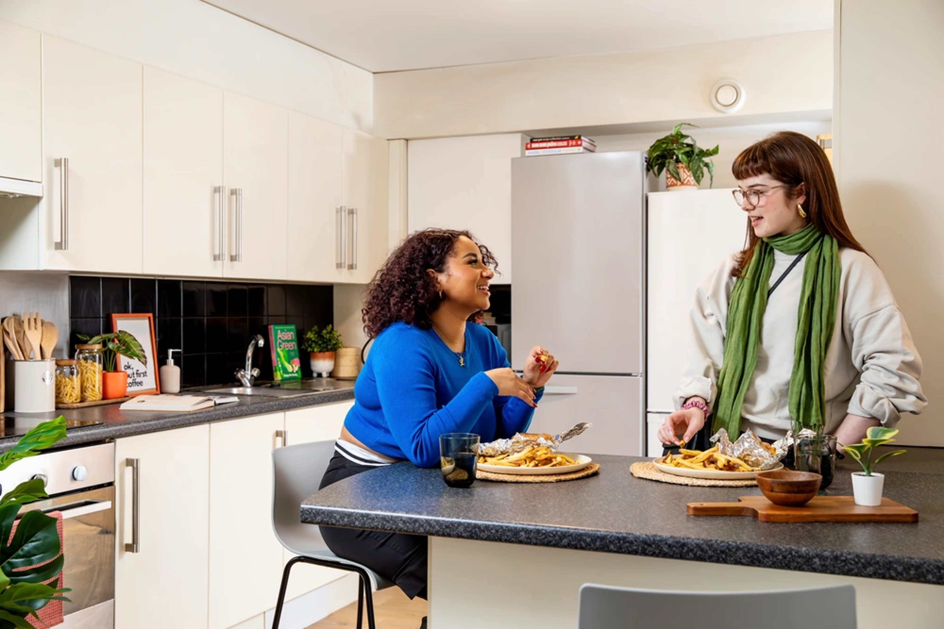 Students in the shared kitchen
