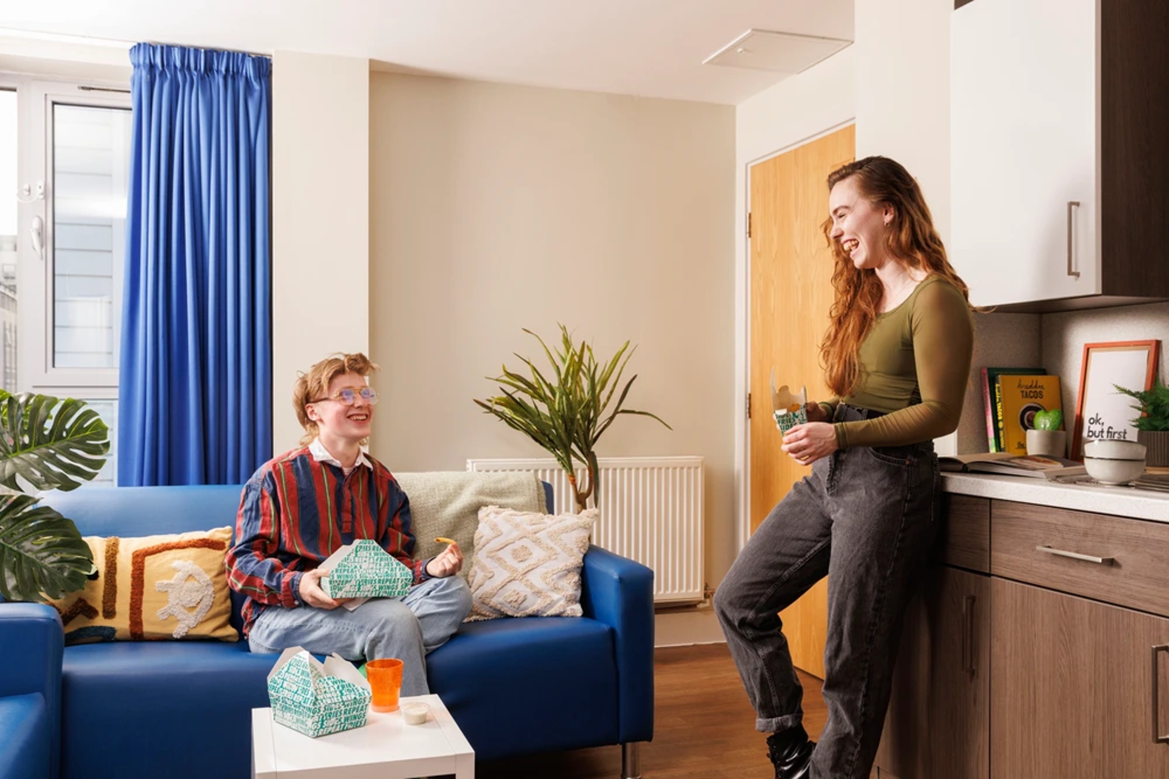 Students in a shared kitchen