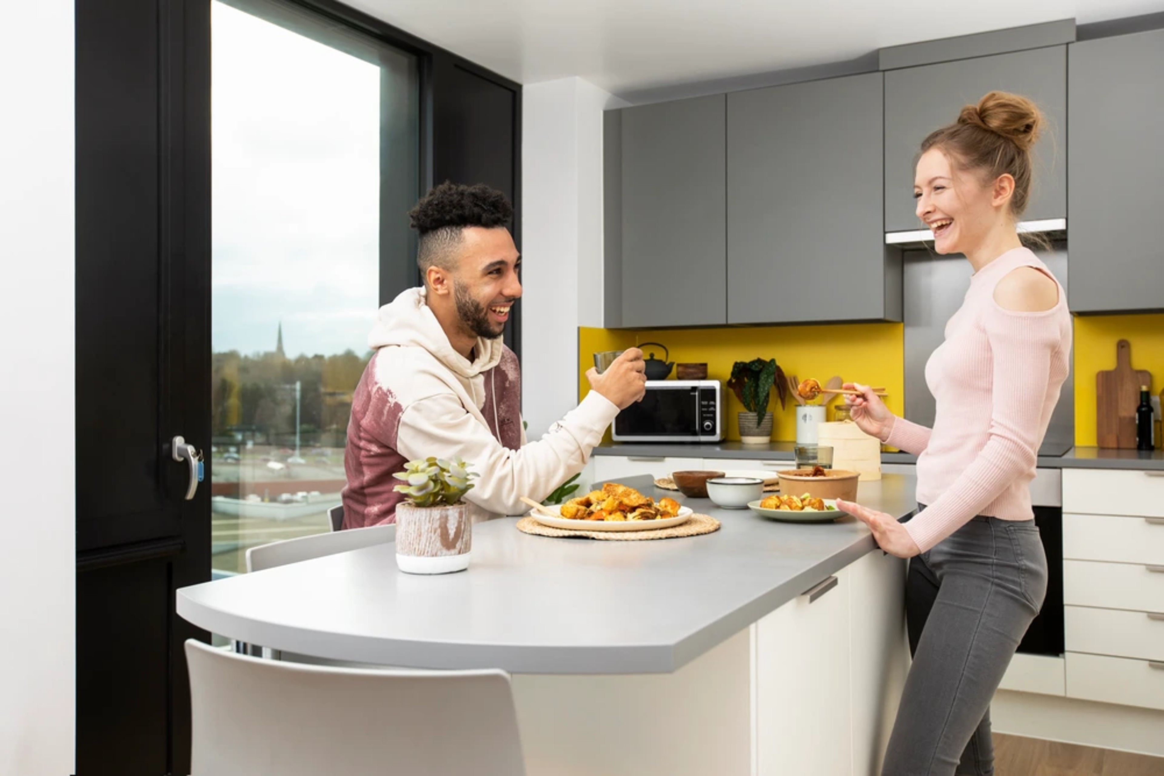 Students using the shared kitchen