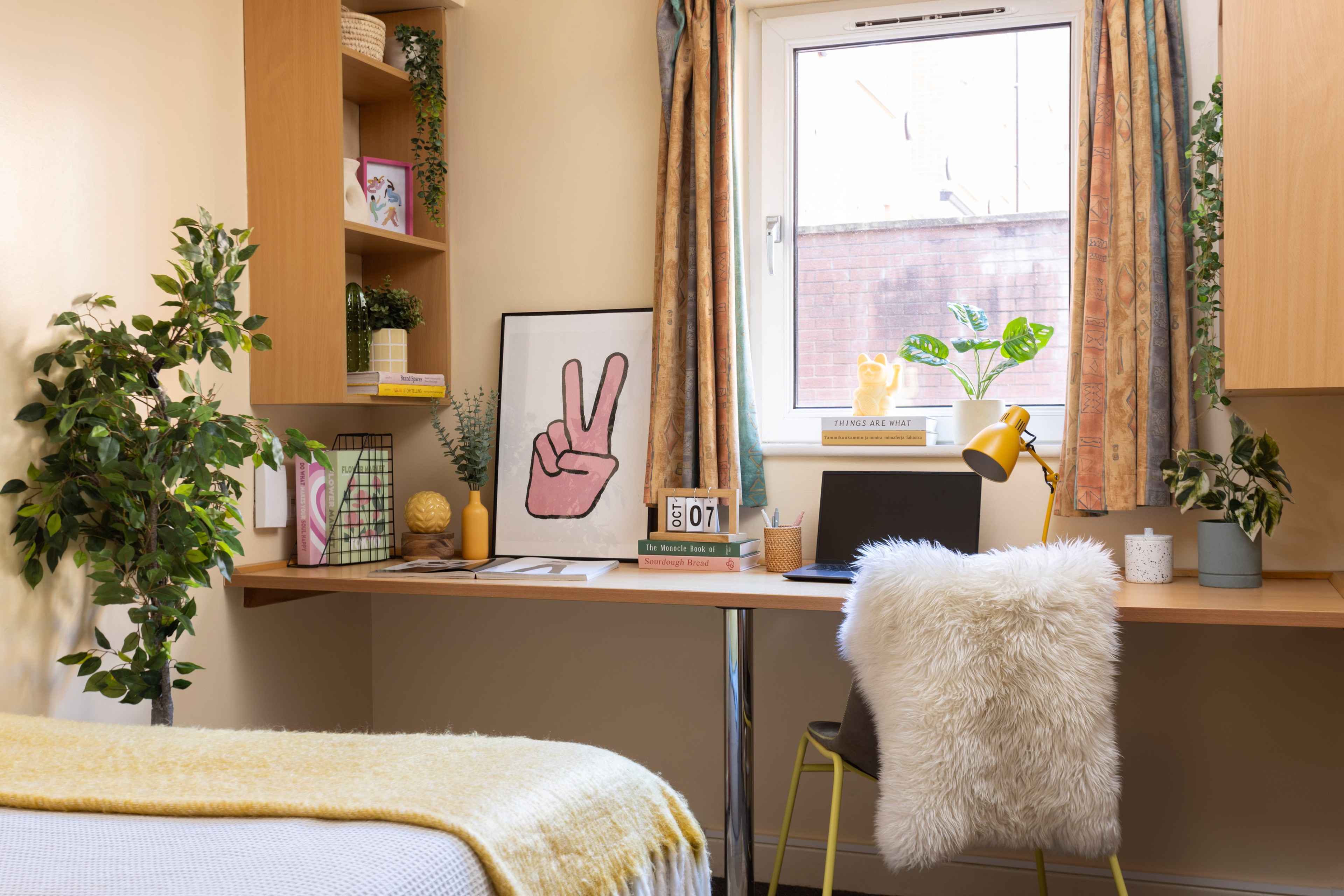 Bed and study space in premium en-suite