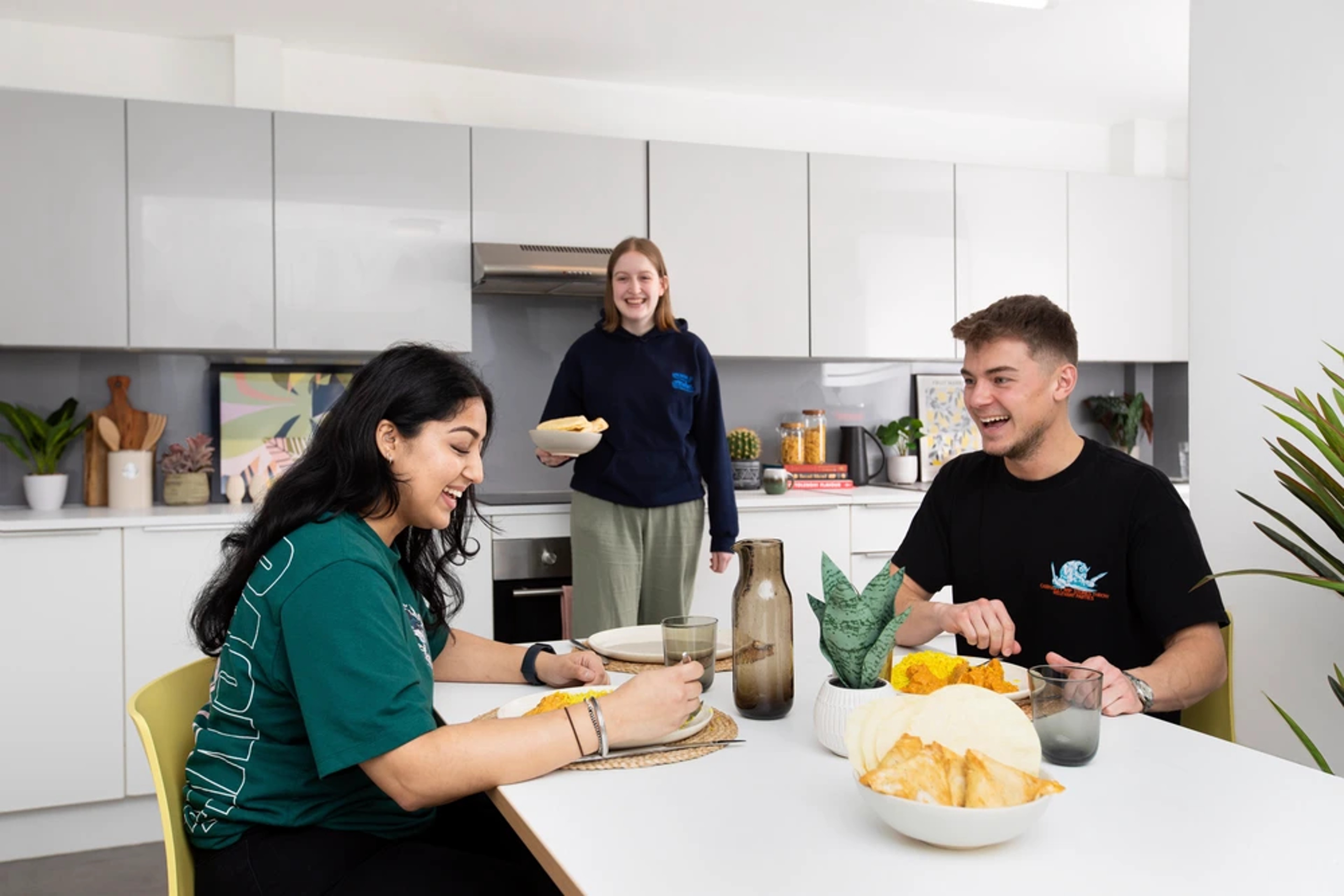 Students in shared kitchen for ensuites