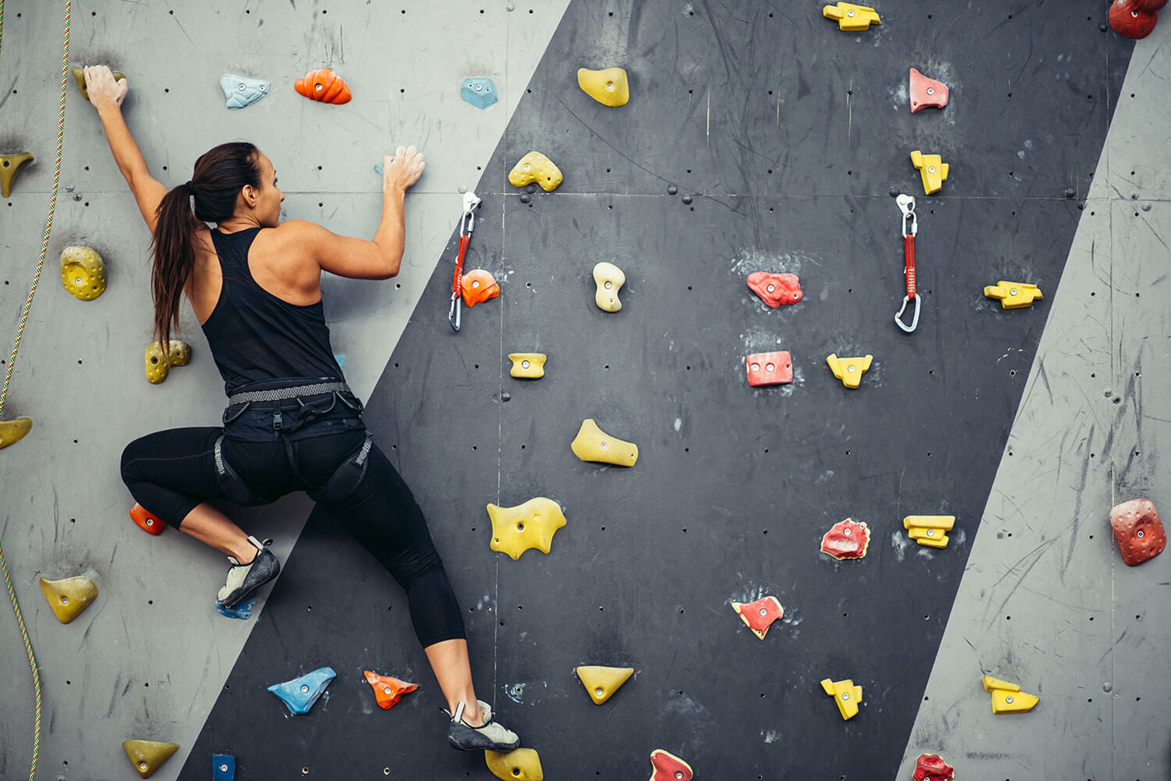 Girl using a climbing wall