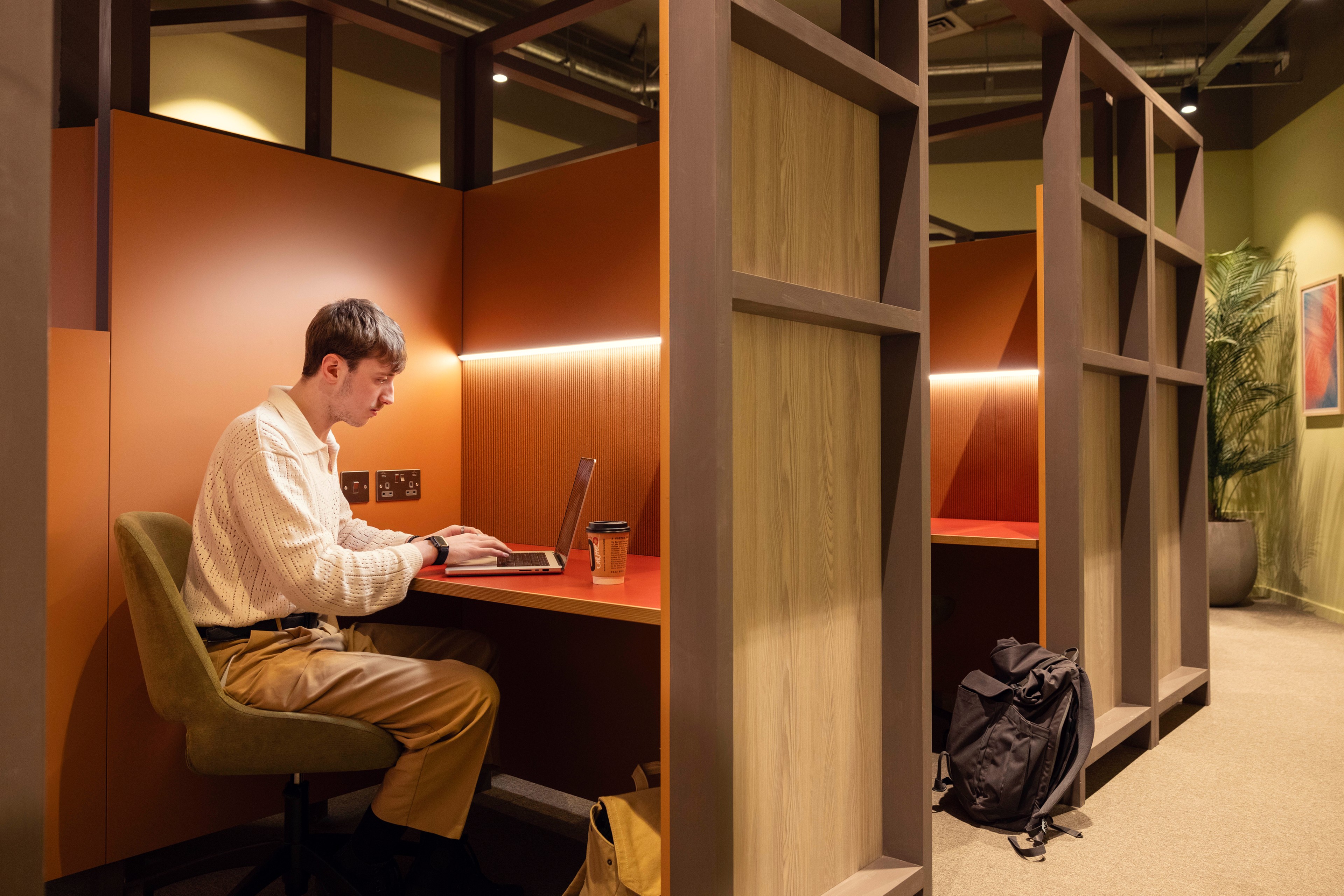 Student using the silent study booths