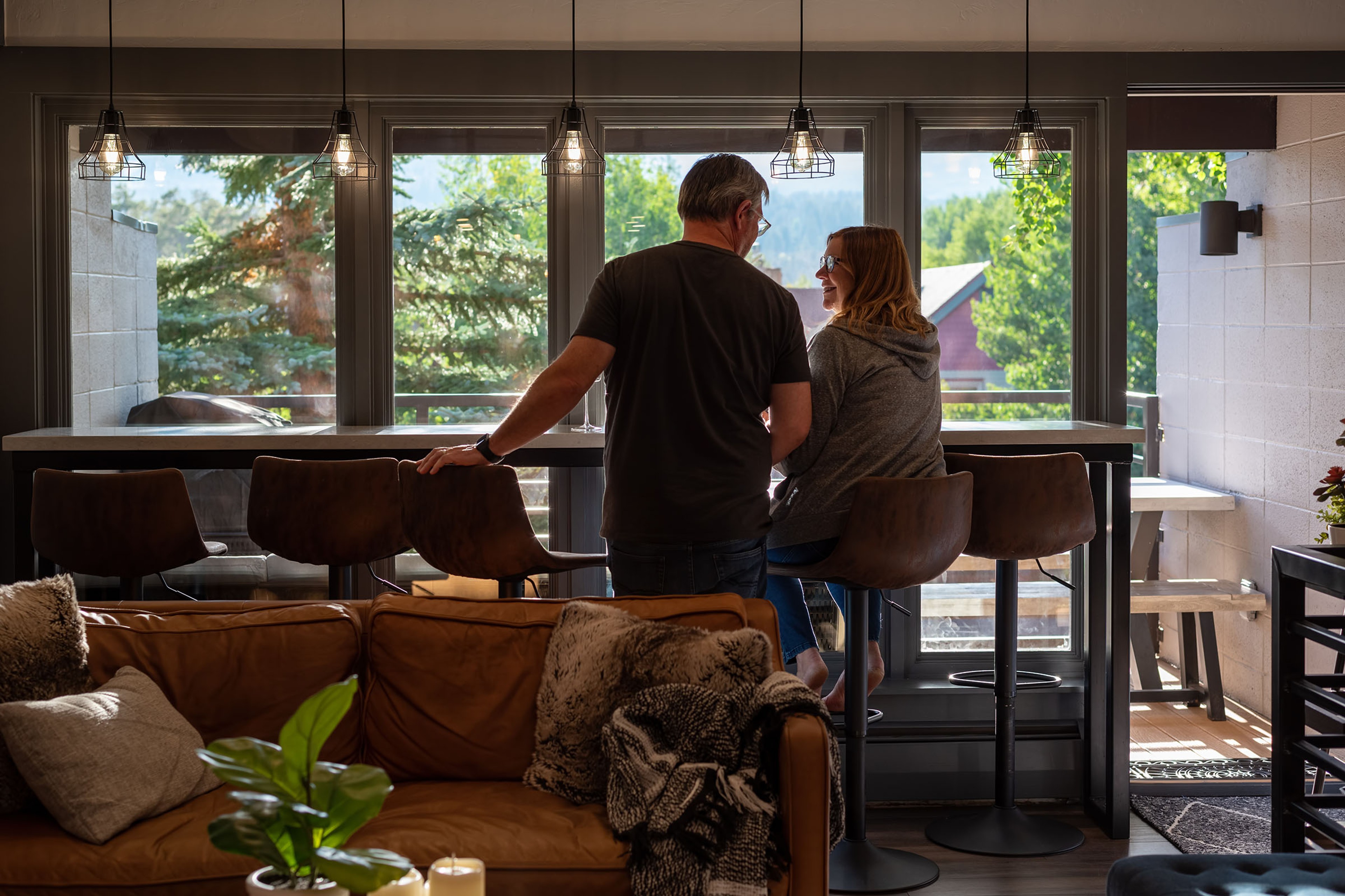 Parents sitting at breakfast bar