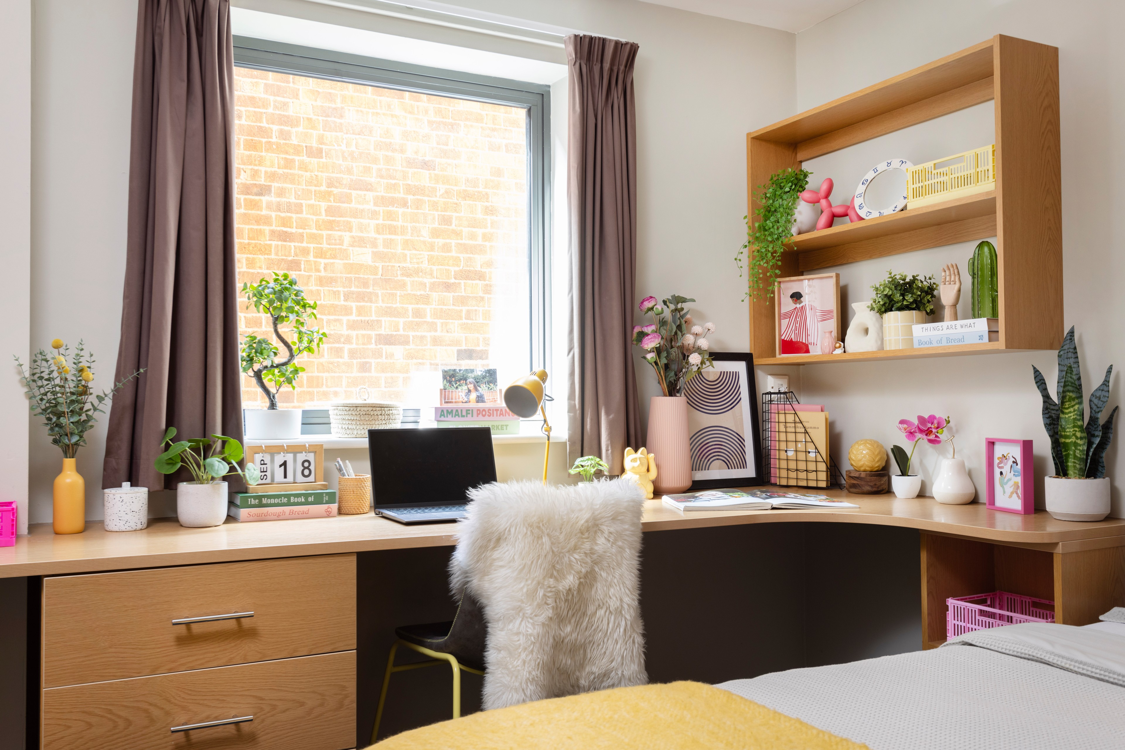 Bed and study space in an En-suite room