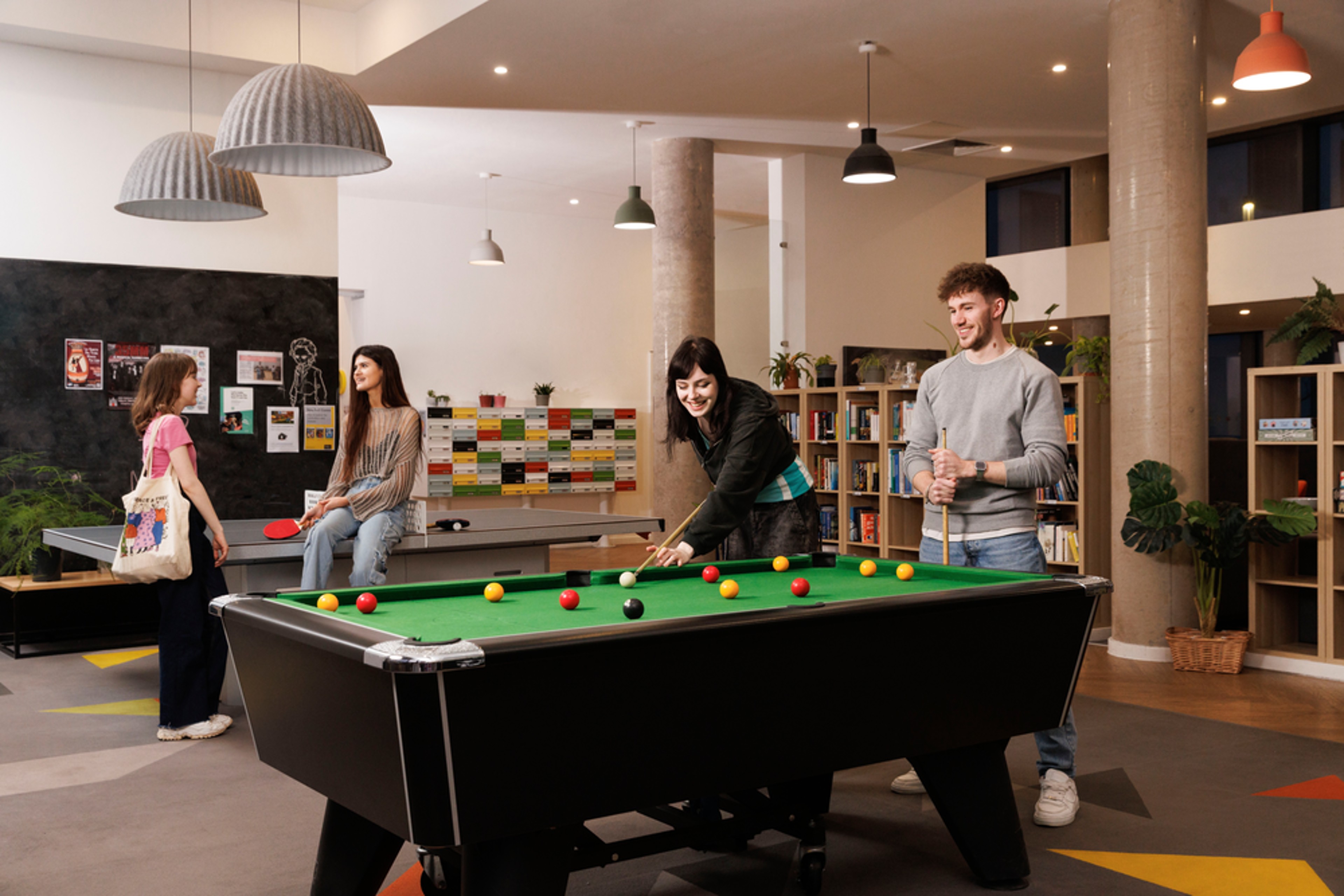 Students in the games area