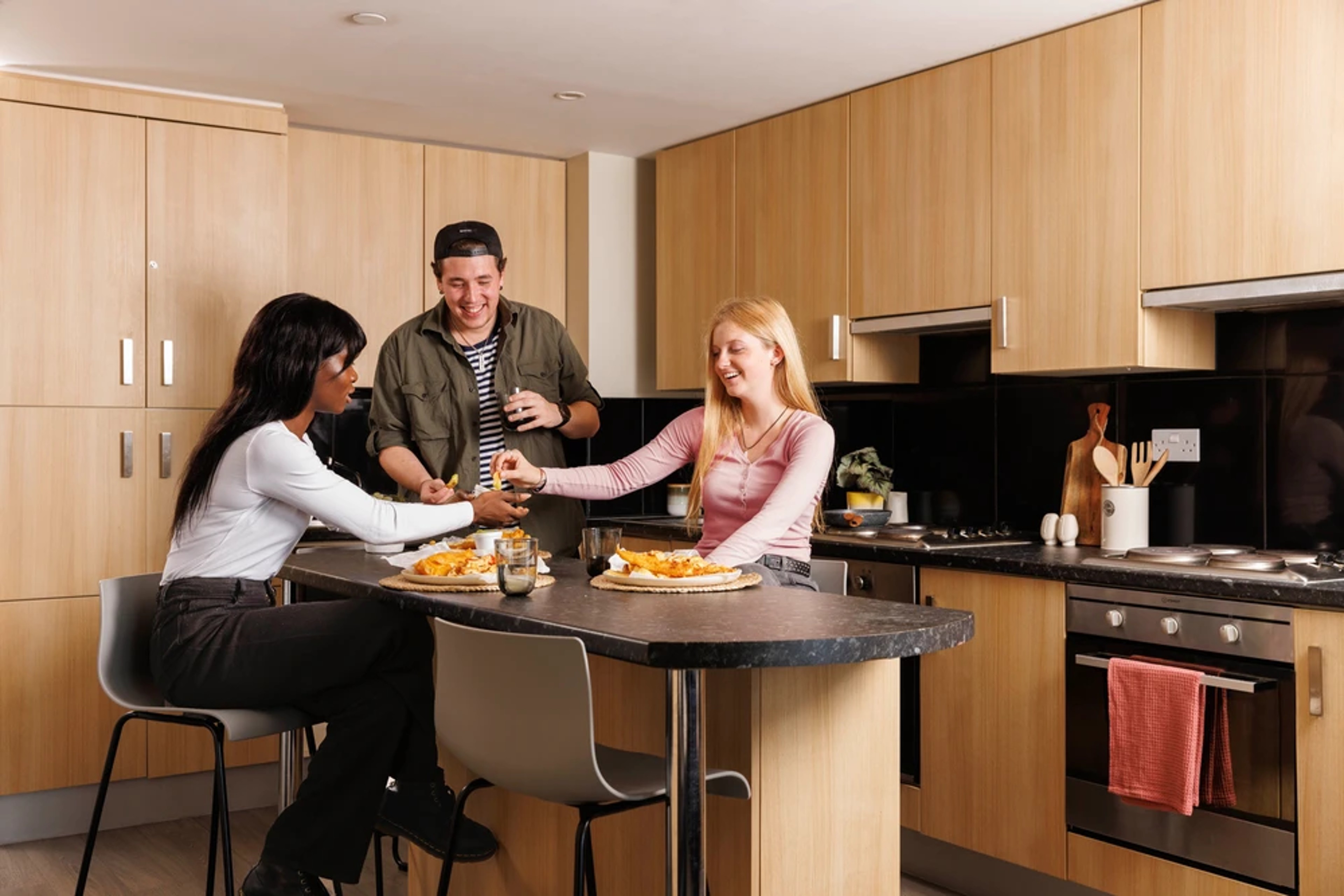Students in a shared kitchen