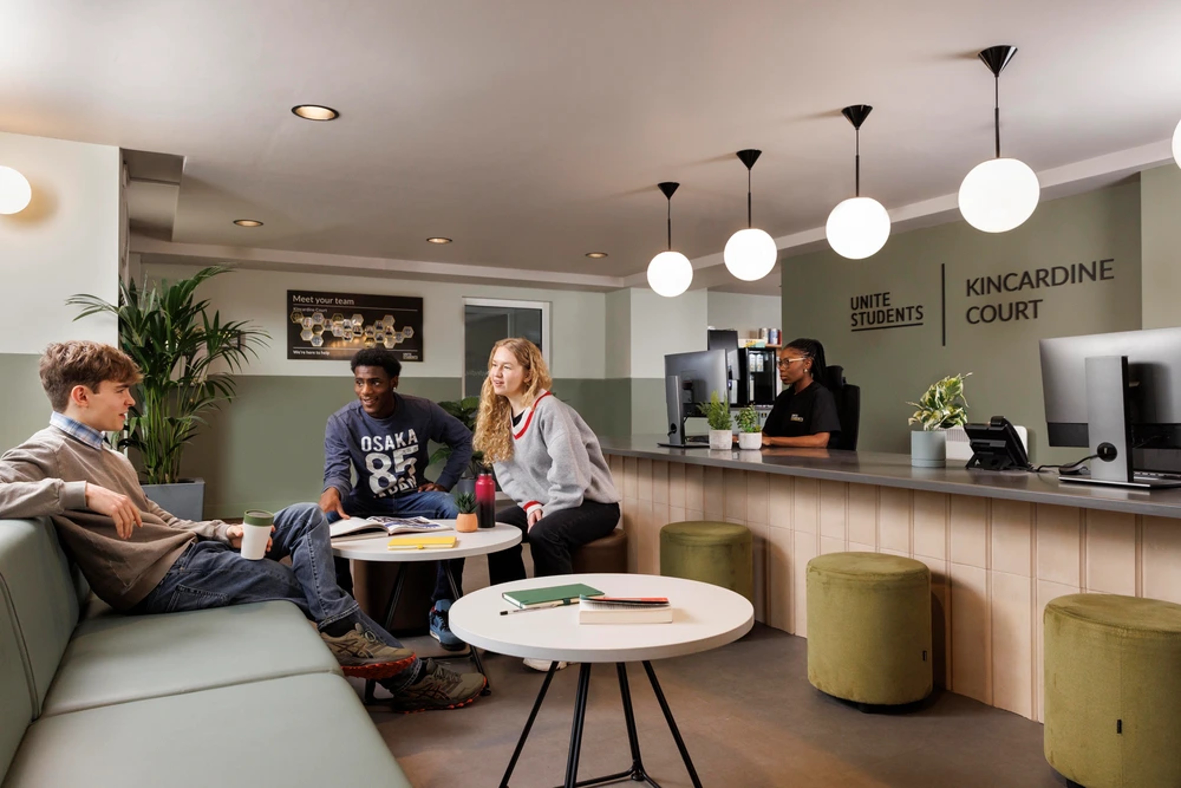 Students in seating area at reception