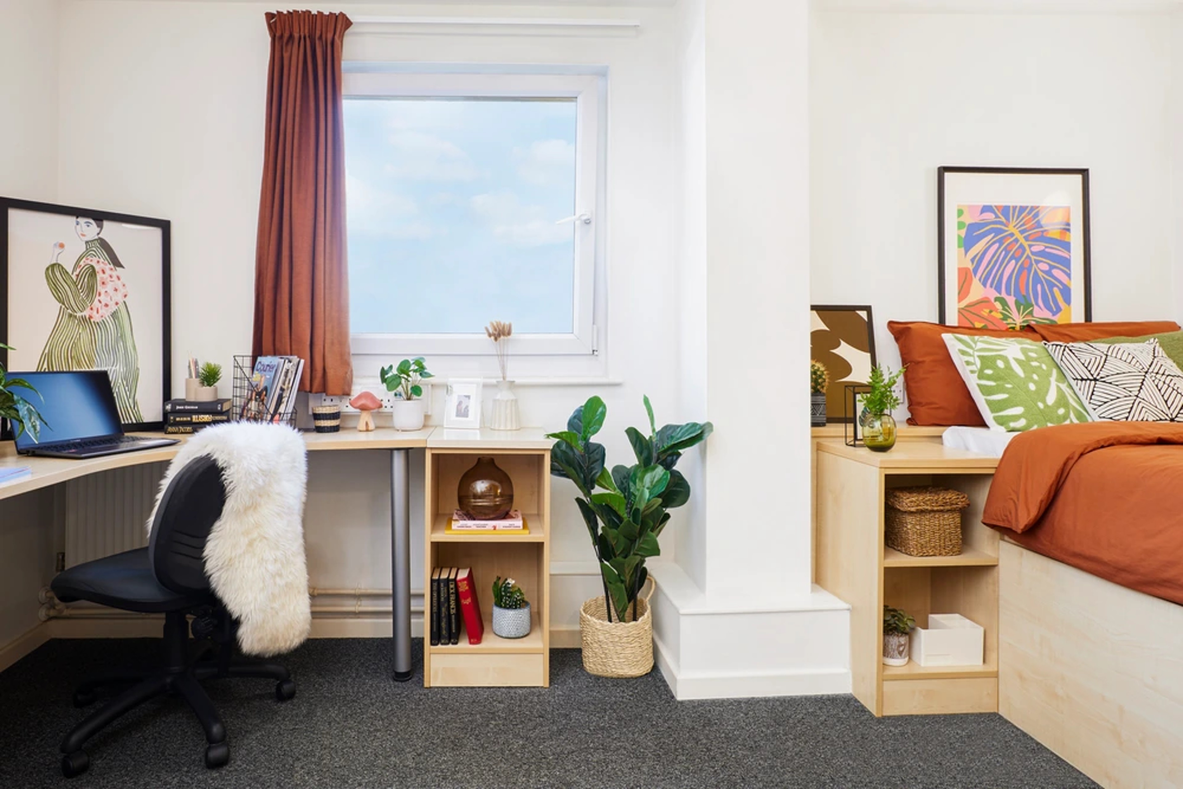 Bed and desk in an Accessible En-suite