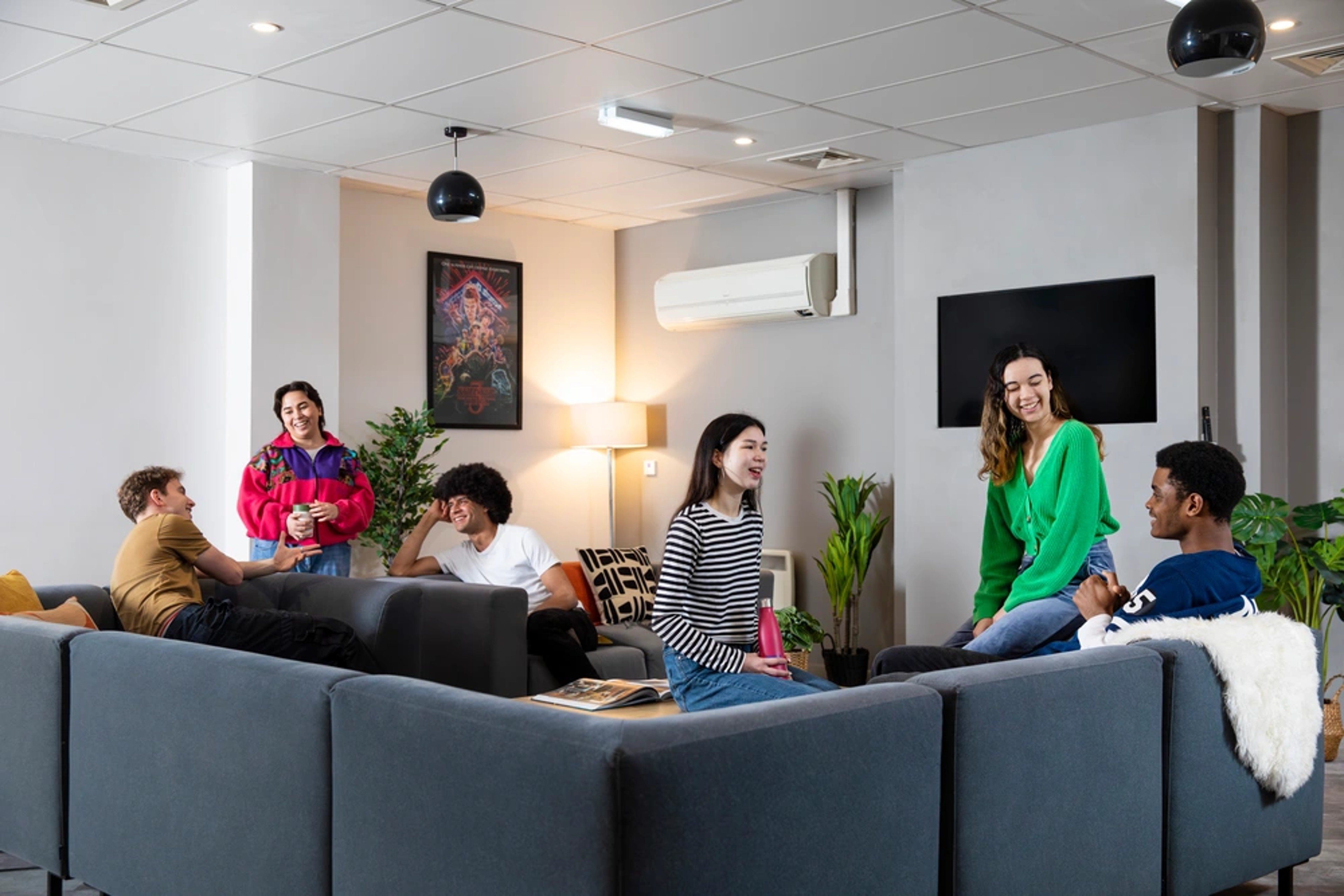 Students in the common room TV area