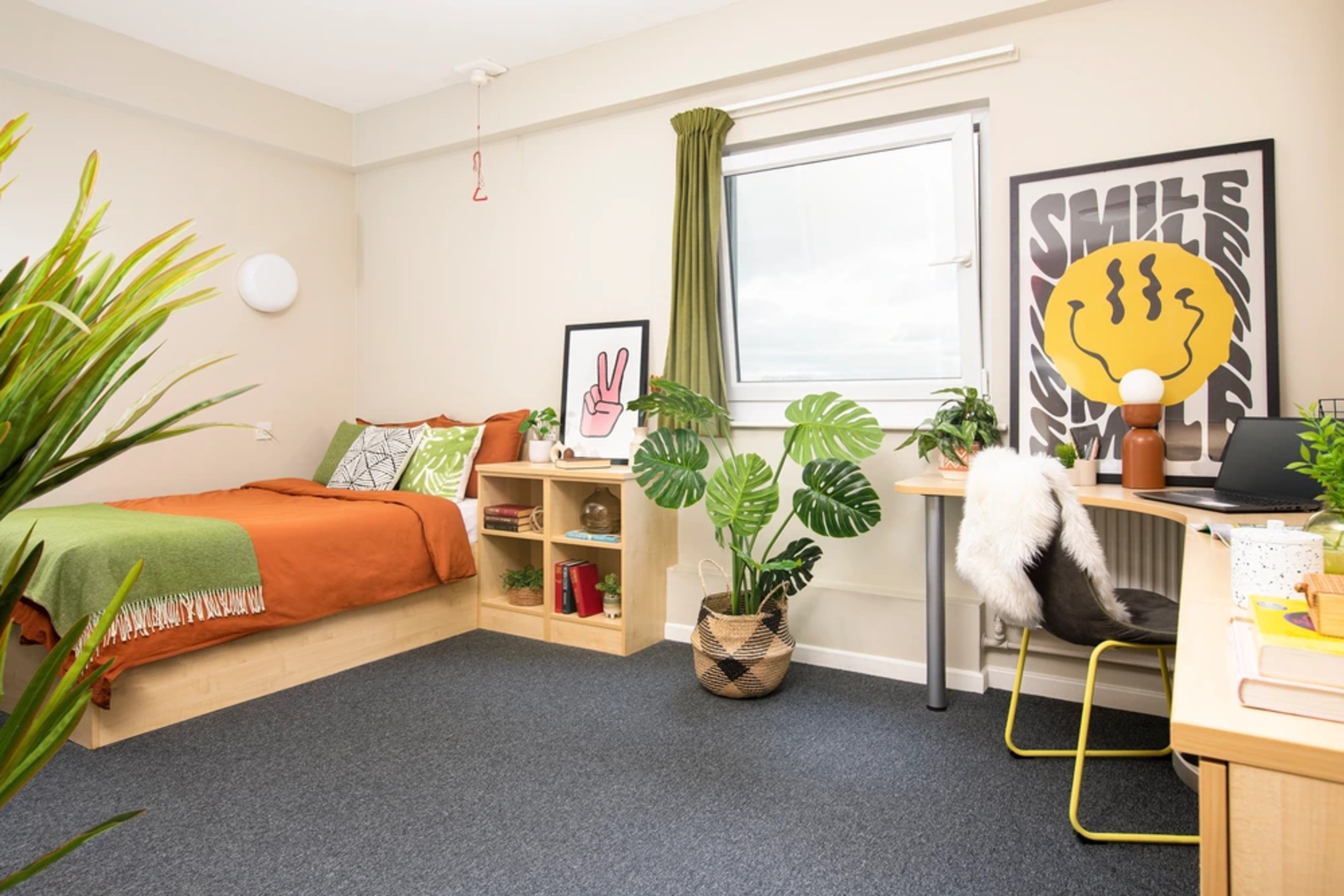 Bed and desk in an Accessible En-suite
