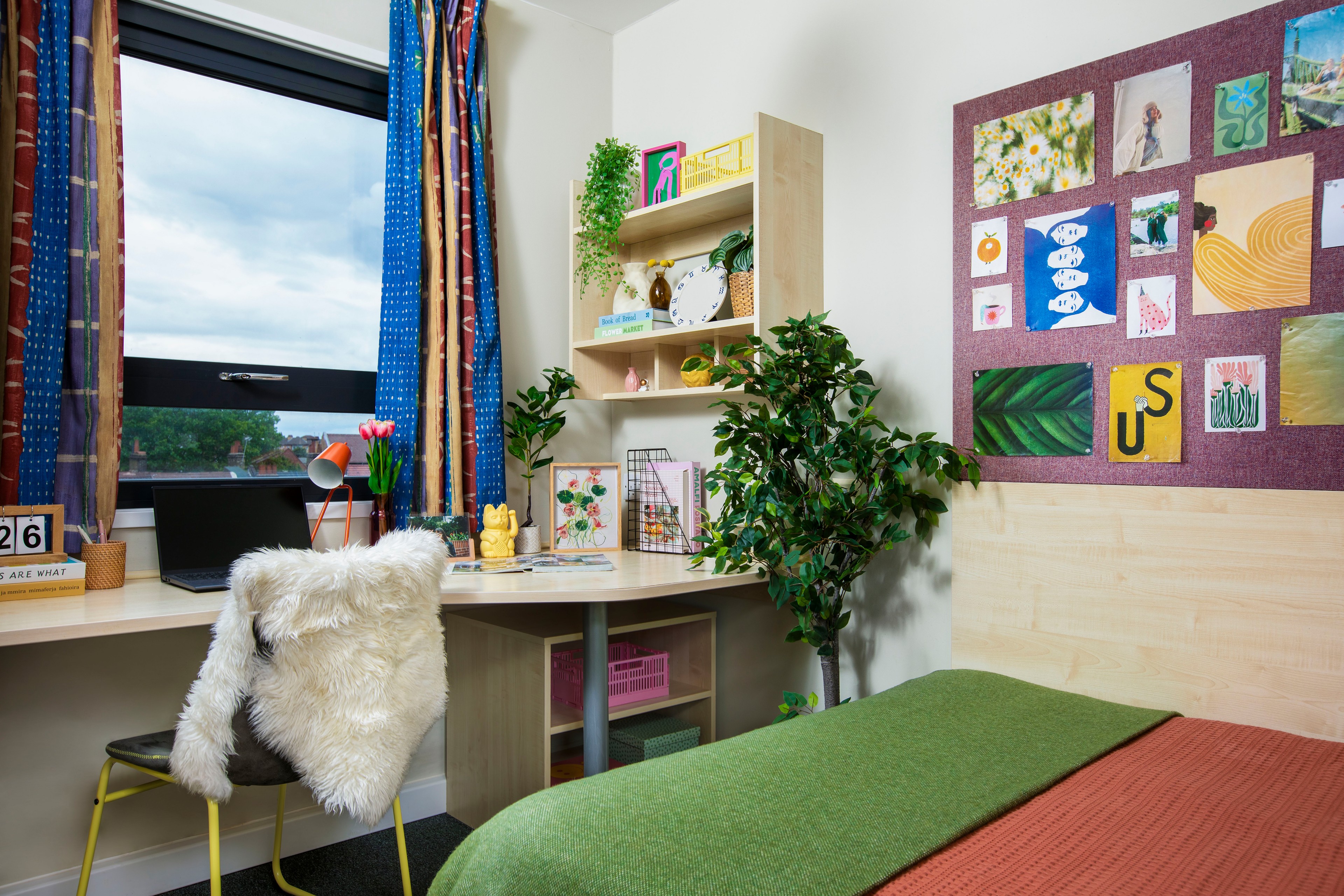 Bed and study space in an En-suite room