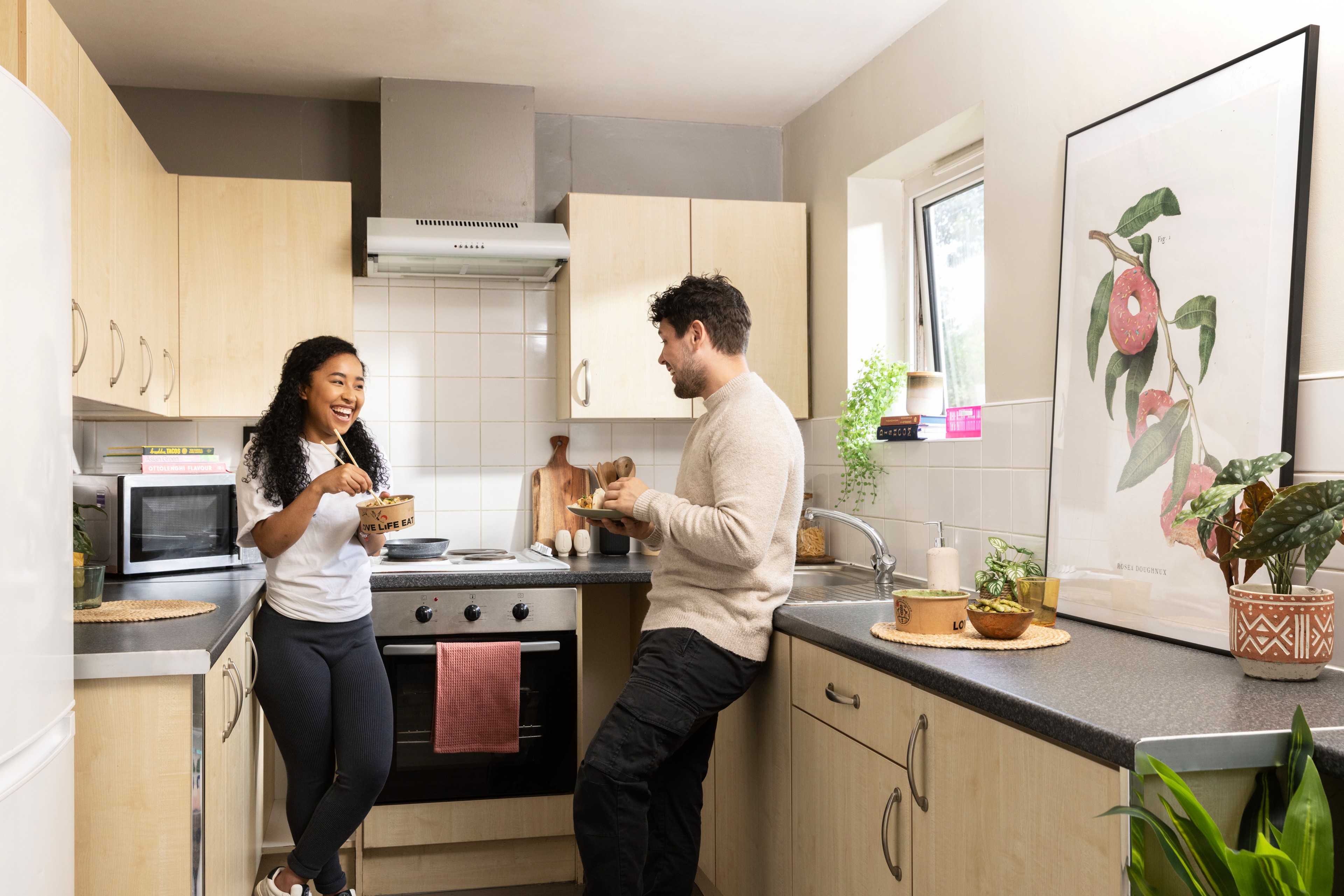 Students in the shared kitchen