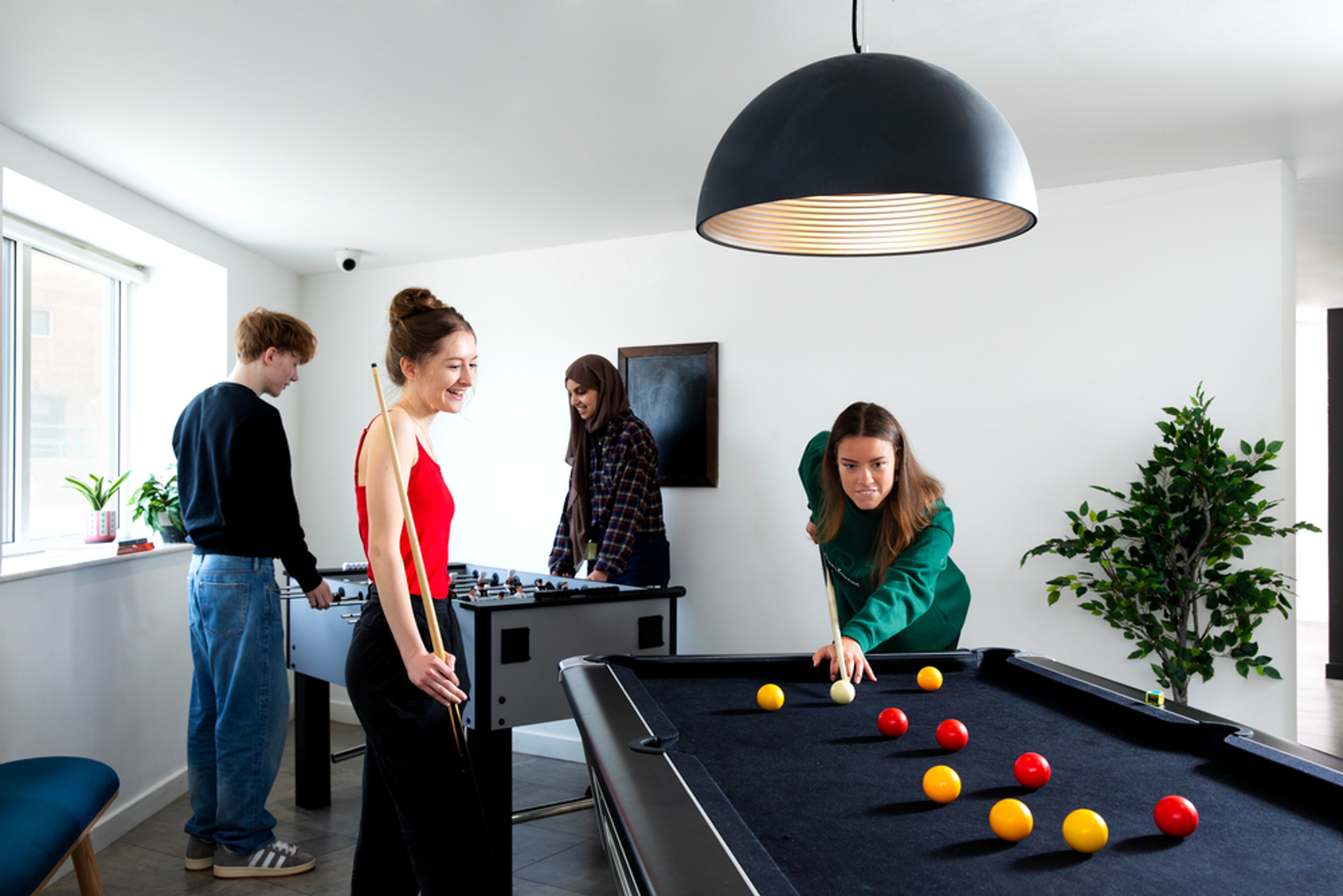 Students in the games area