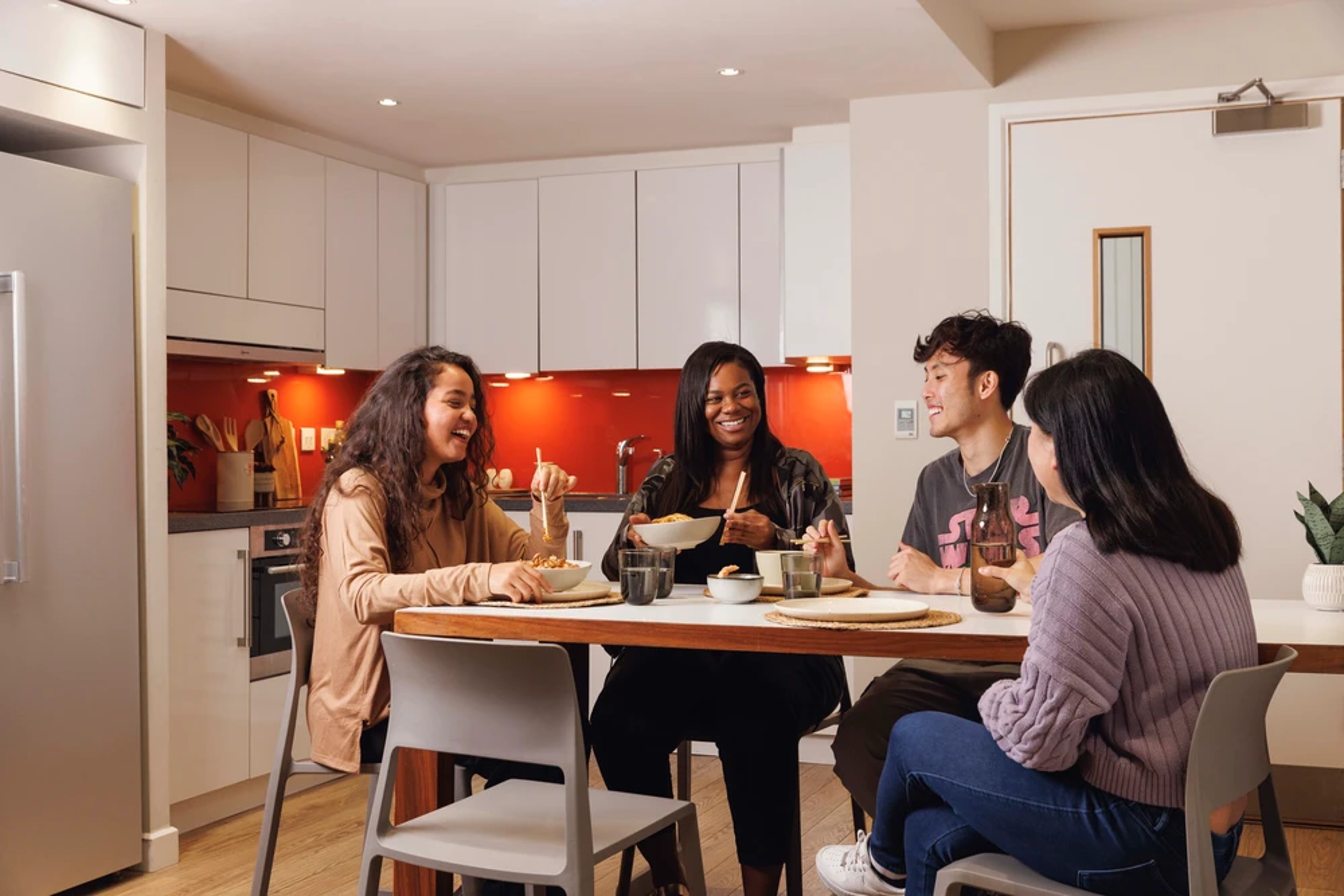 Students using a shared kitchen