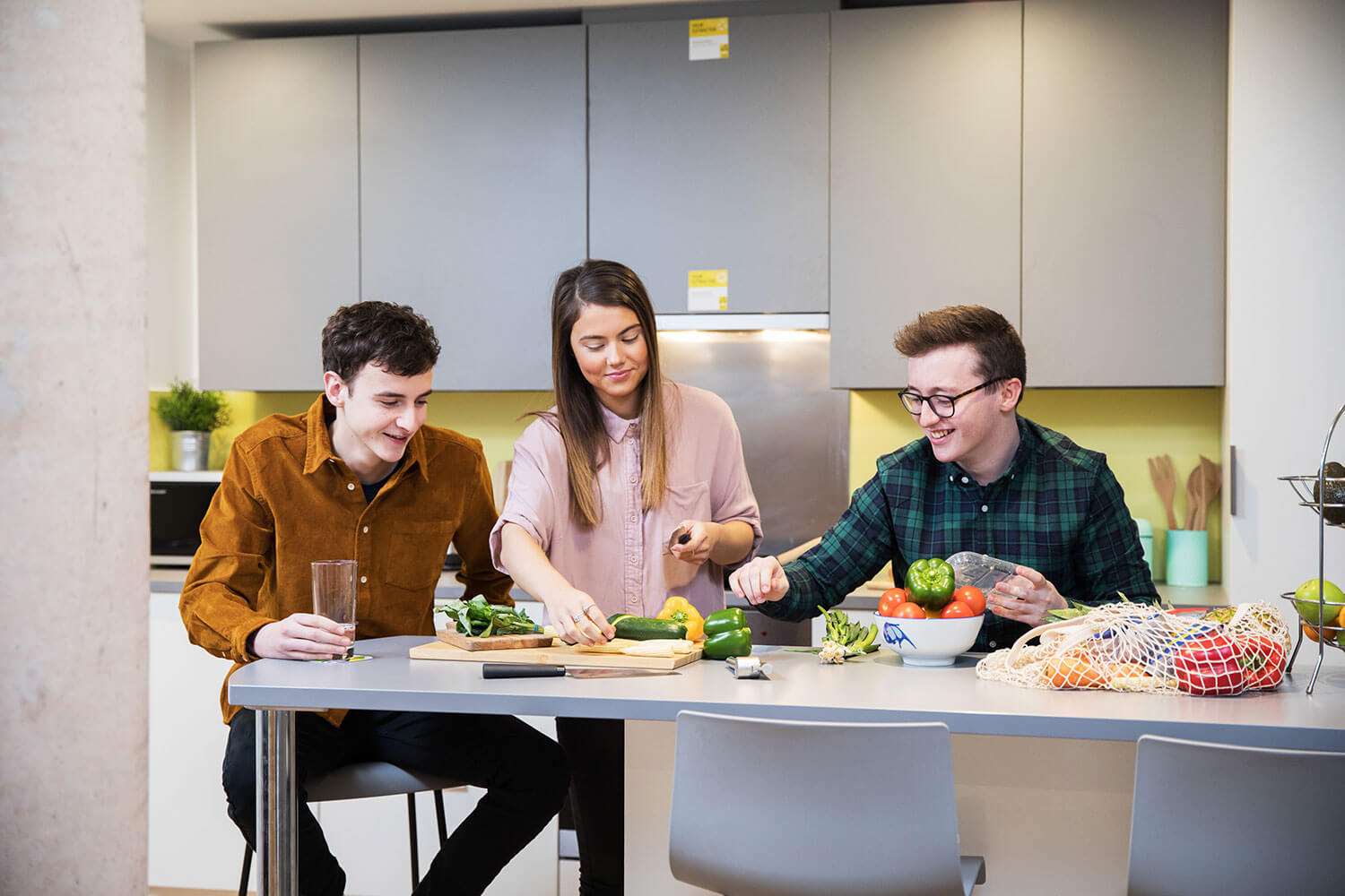 Students cooking in shared accommodation