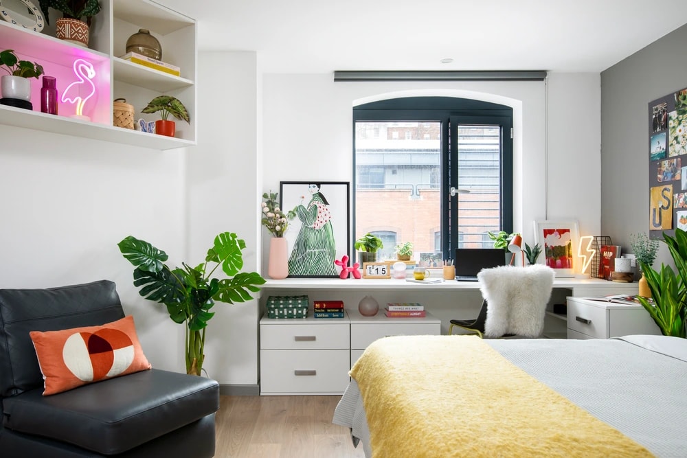 Bed and desk in an Accessible Studio