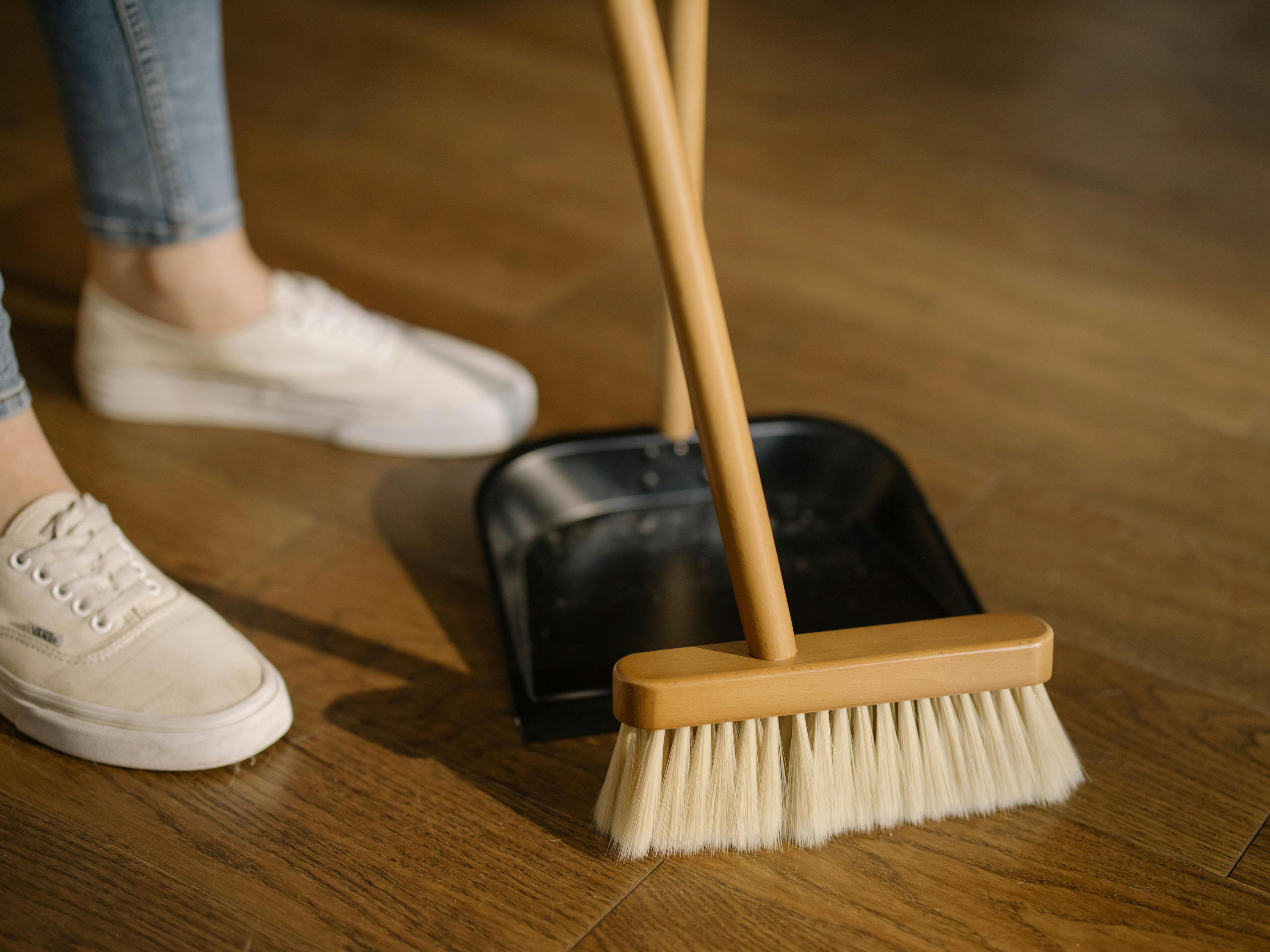 Photo of someone sweeping the floor