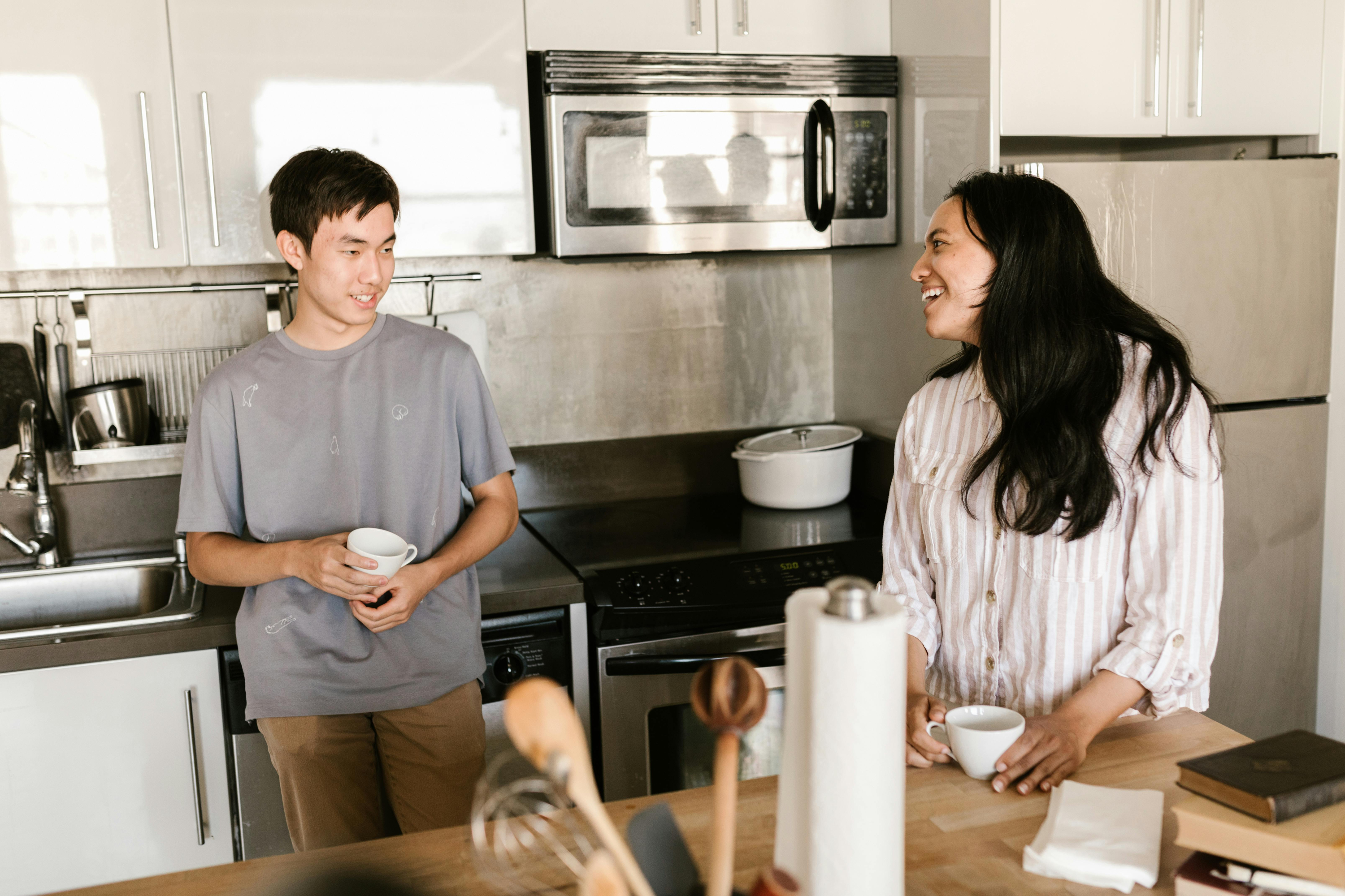 Two flatmates in kitchen