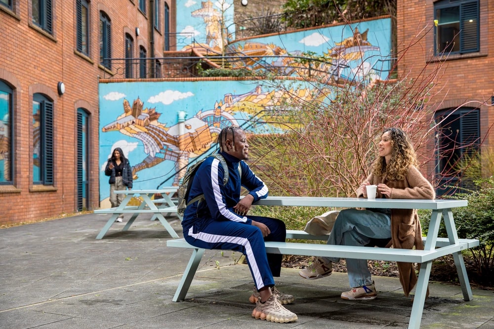 Students in courtyard at Brunel House